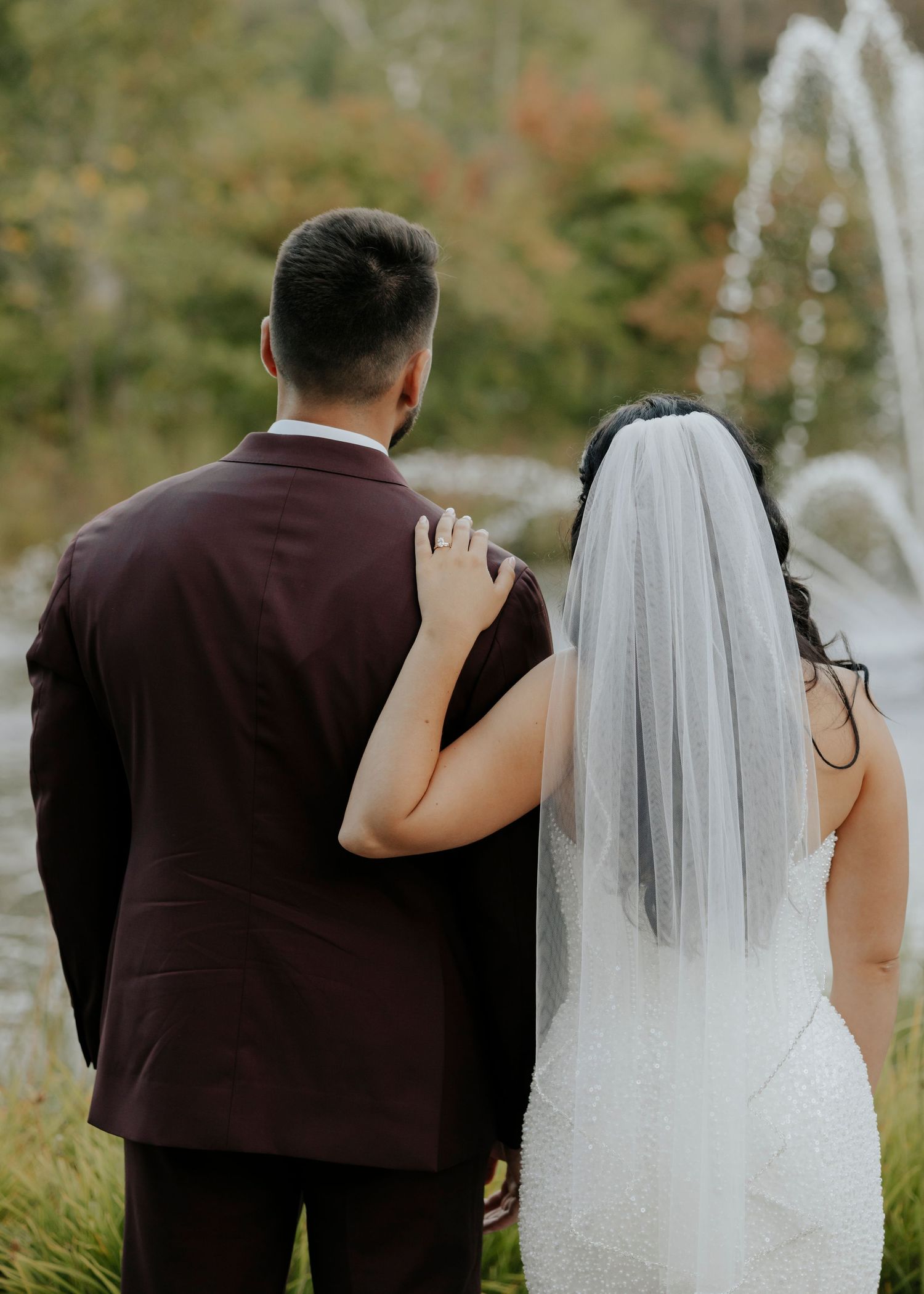 A series of photos showing a bride and groom walking together outdoors, captured from behind.