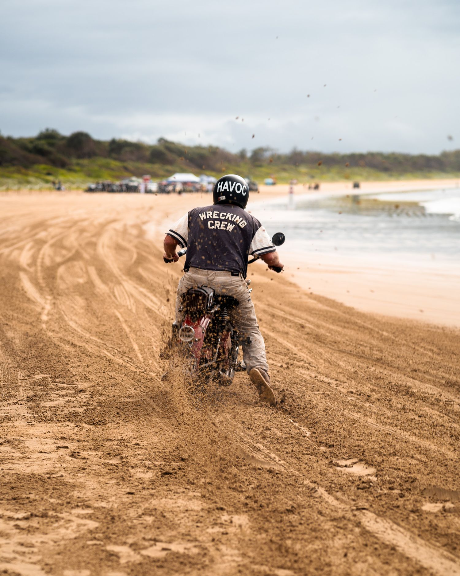 Man on a motorcycle on a beach