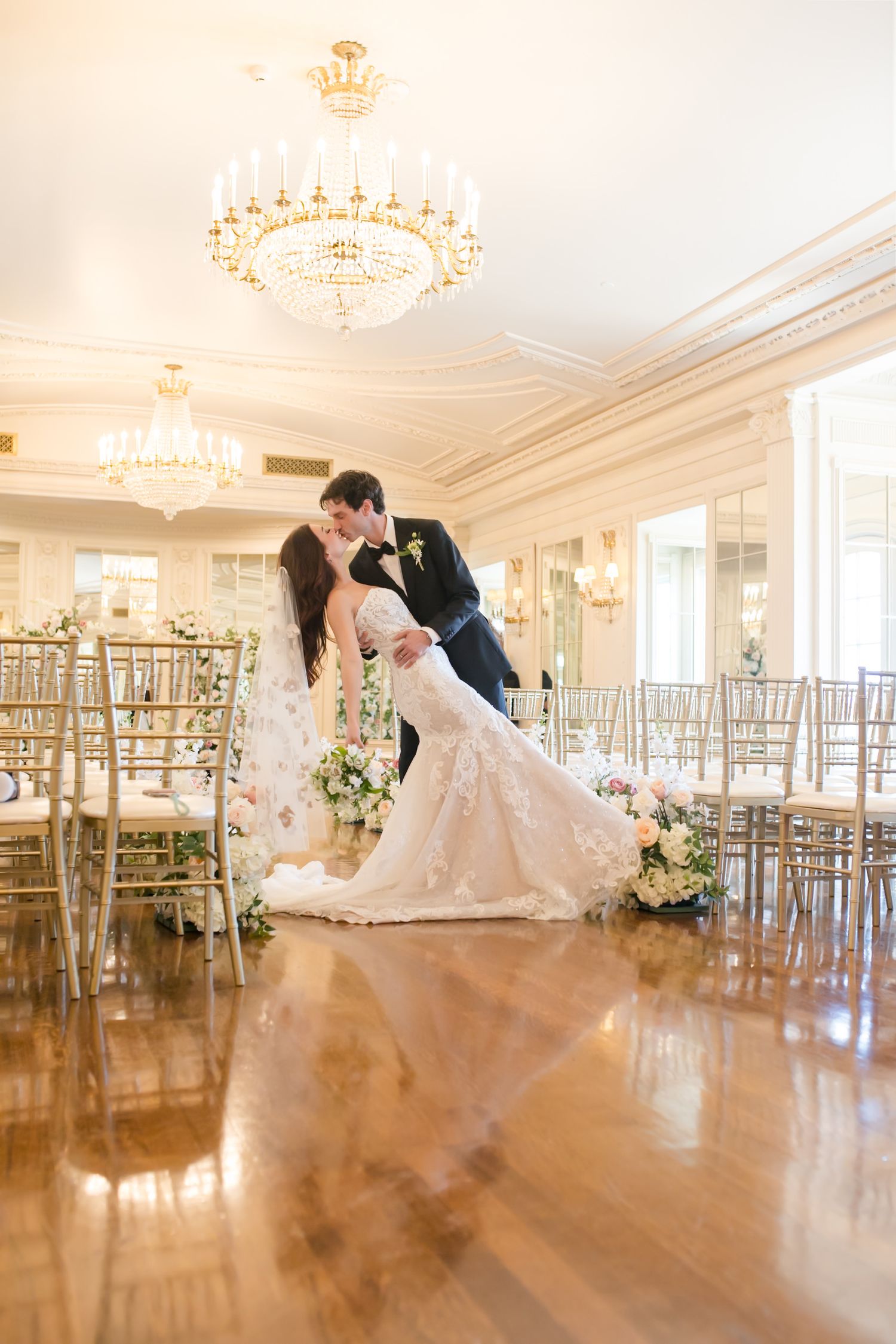 Romantic wedding photos in an elegant ballroom with crystal chandeliers and hardwood floors. Models, Wedding photographer TX