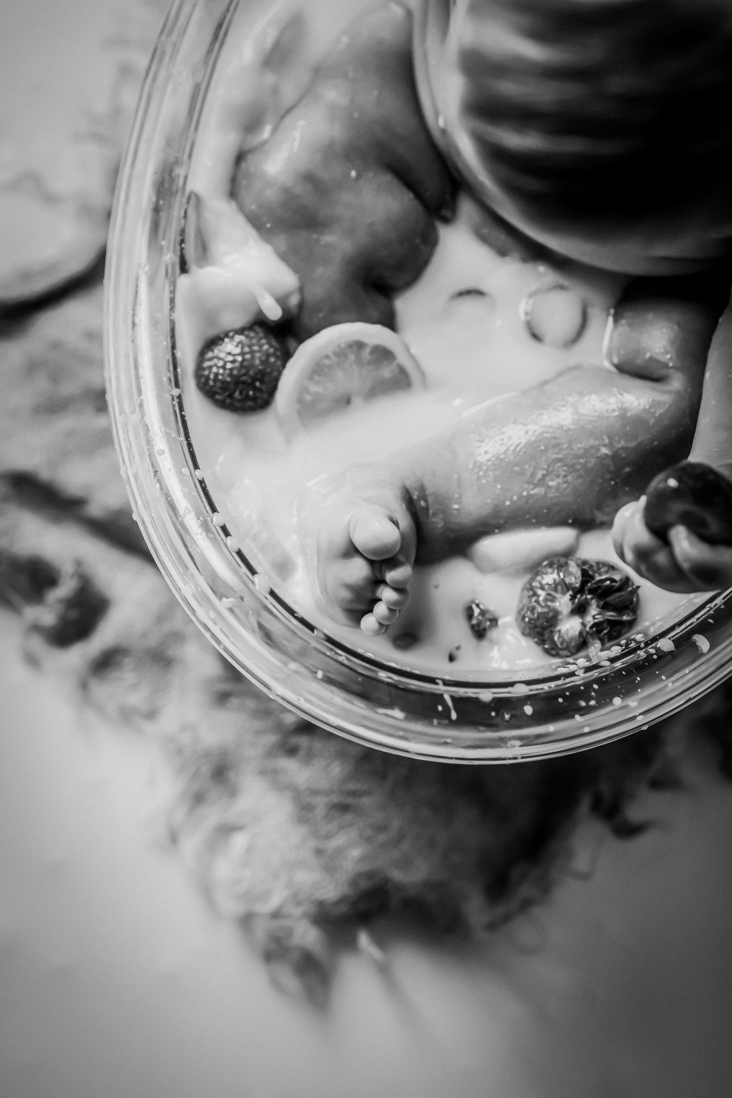Black and white close-up photo sequence showing cigarette smoke swirling around in an ashtray.