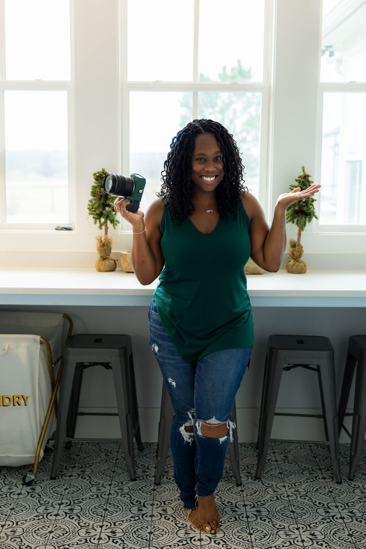 A series of four progressive photos showing a joyful moment of celebration against a bright interior wall.