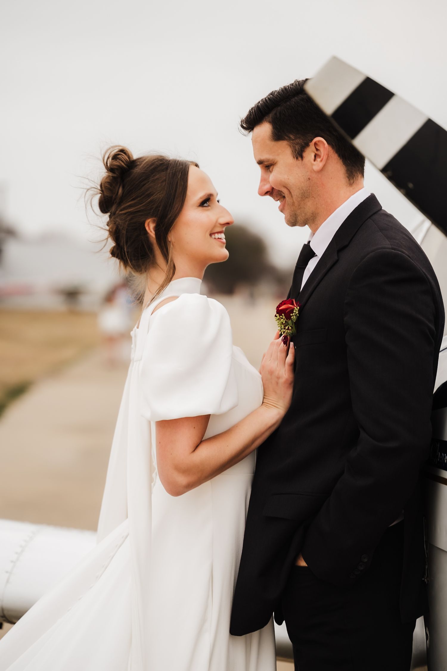 A romantic wedding moment captured in a series of black and white photos showing tender interactions between the newlyweds.