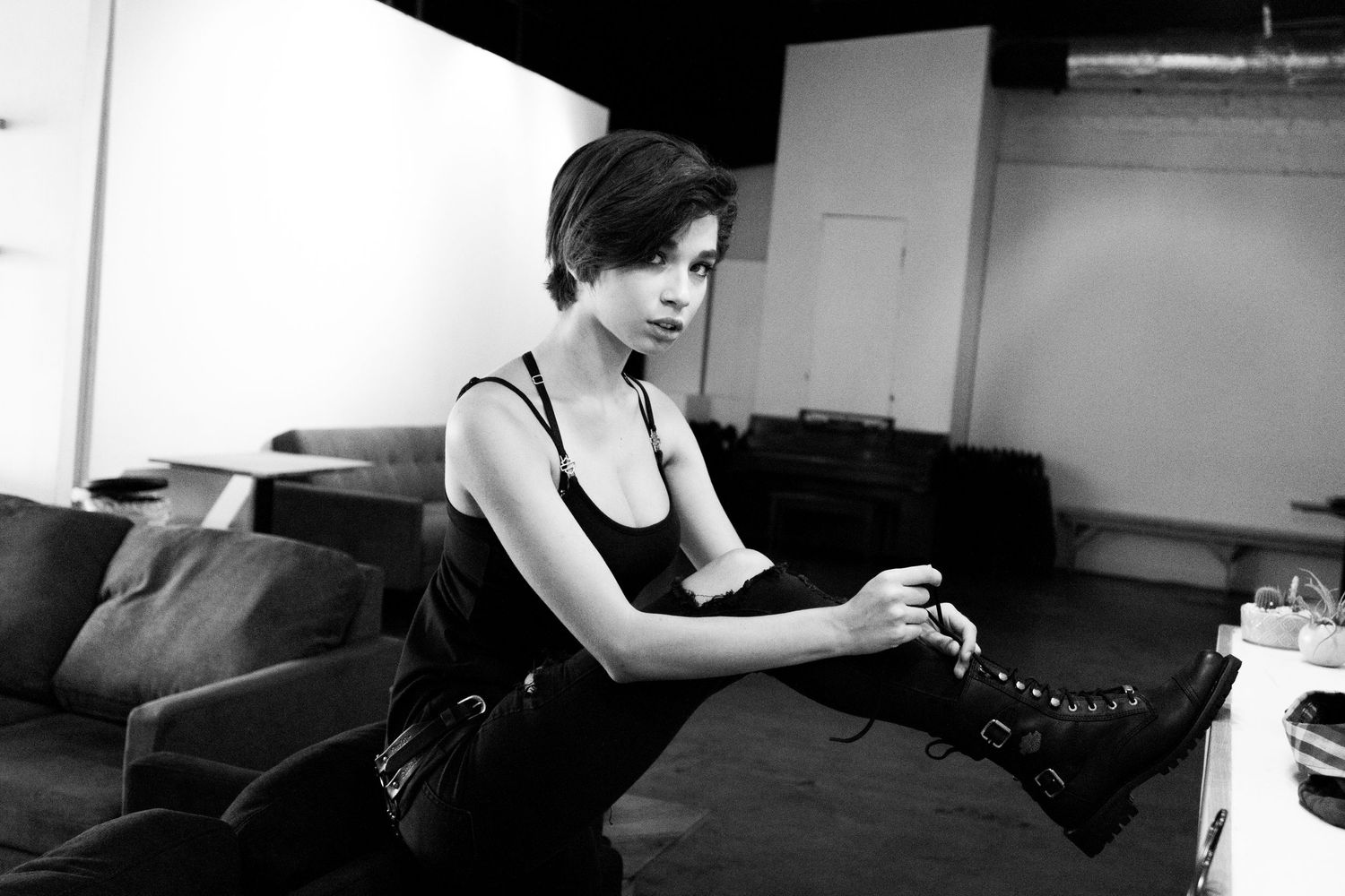 Behind the scenes moment with model preparing for the photo shoot