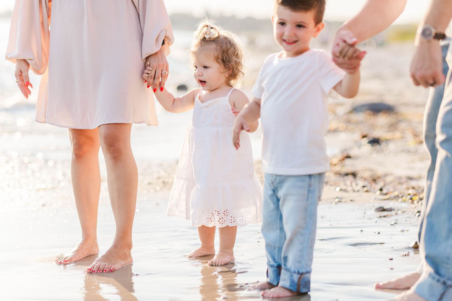 Close-up of siblings on the beach during outdoor family session -- Minmo Photography