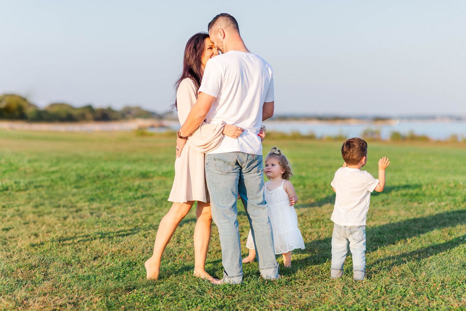 Couple embracing during a Connecticut photography session outdoors — Minmo Photography