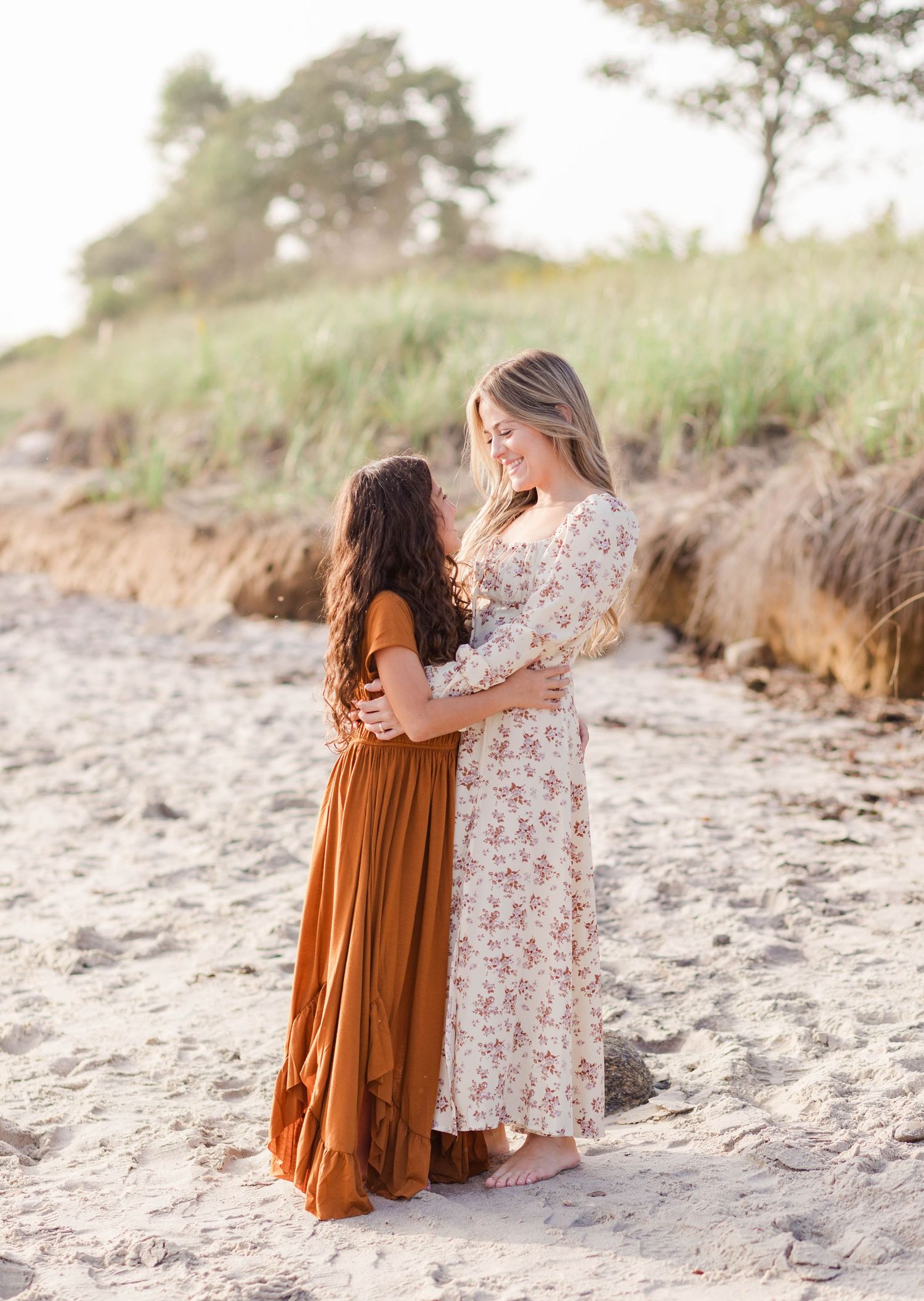 Candid portrait of a woman smiling at her daughter during a family session in Connecticut — Minmo Photography