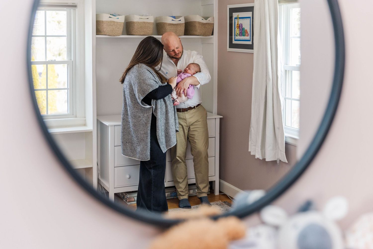 Parents cradling their newborn during a lifestyle newborn session in Connecticut — Minmo Photography