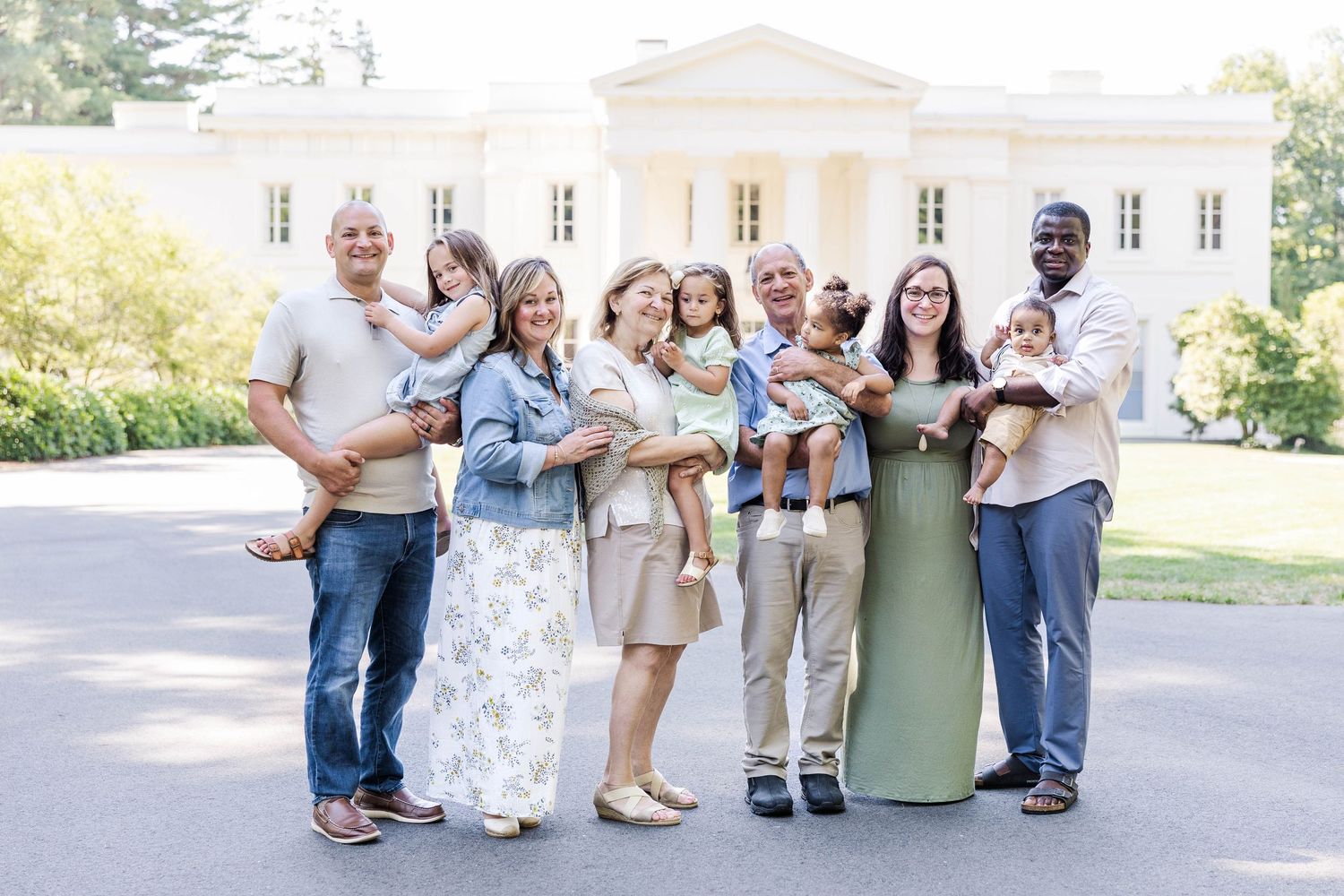Three generations of family laughing together during a Connecticut portrait session — Minmo Photography