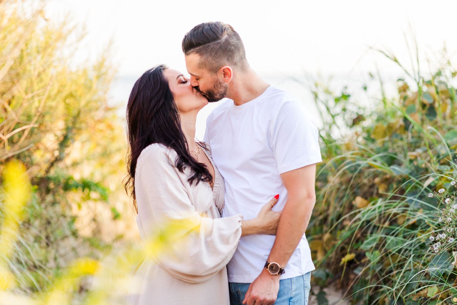 Couple kissing among the trees during golden hour photoshoot -- Minmo Photography