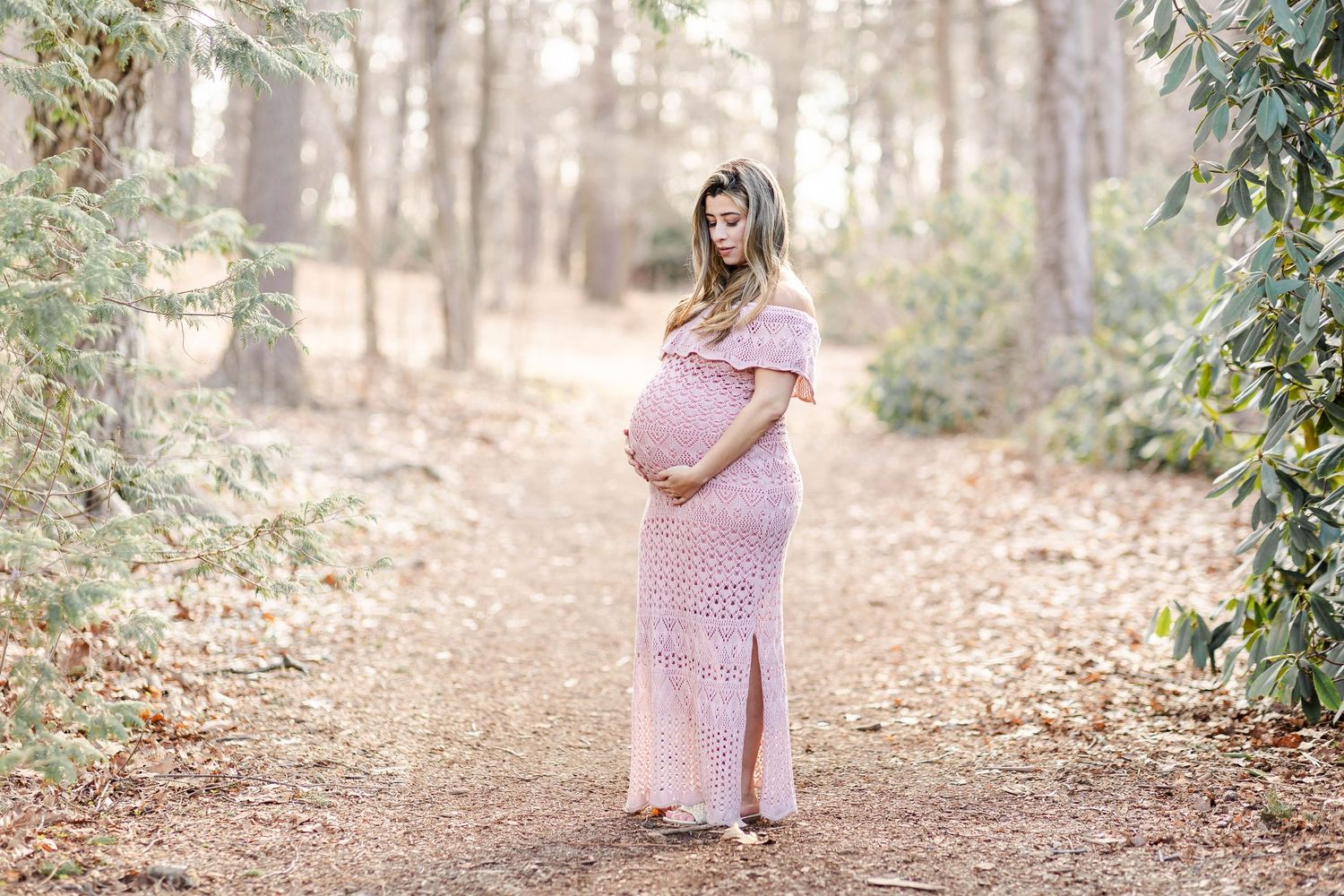 Maternity portrait of a woman in a flowing dress during a Connecticut outdoor session — Minmo Photography