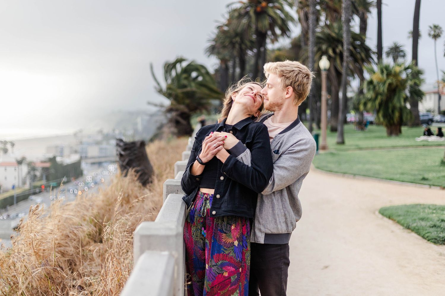 Couple standing together by the ocean during a Los Angeles engagement session — Minmo Photography