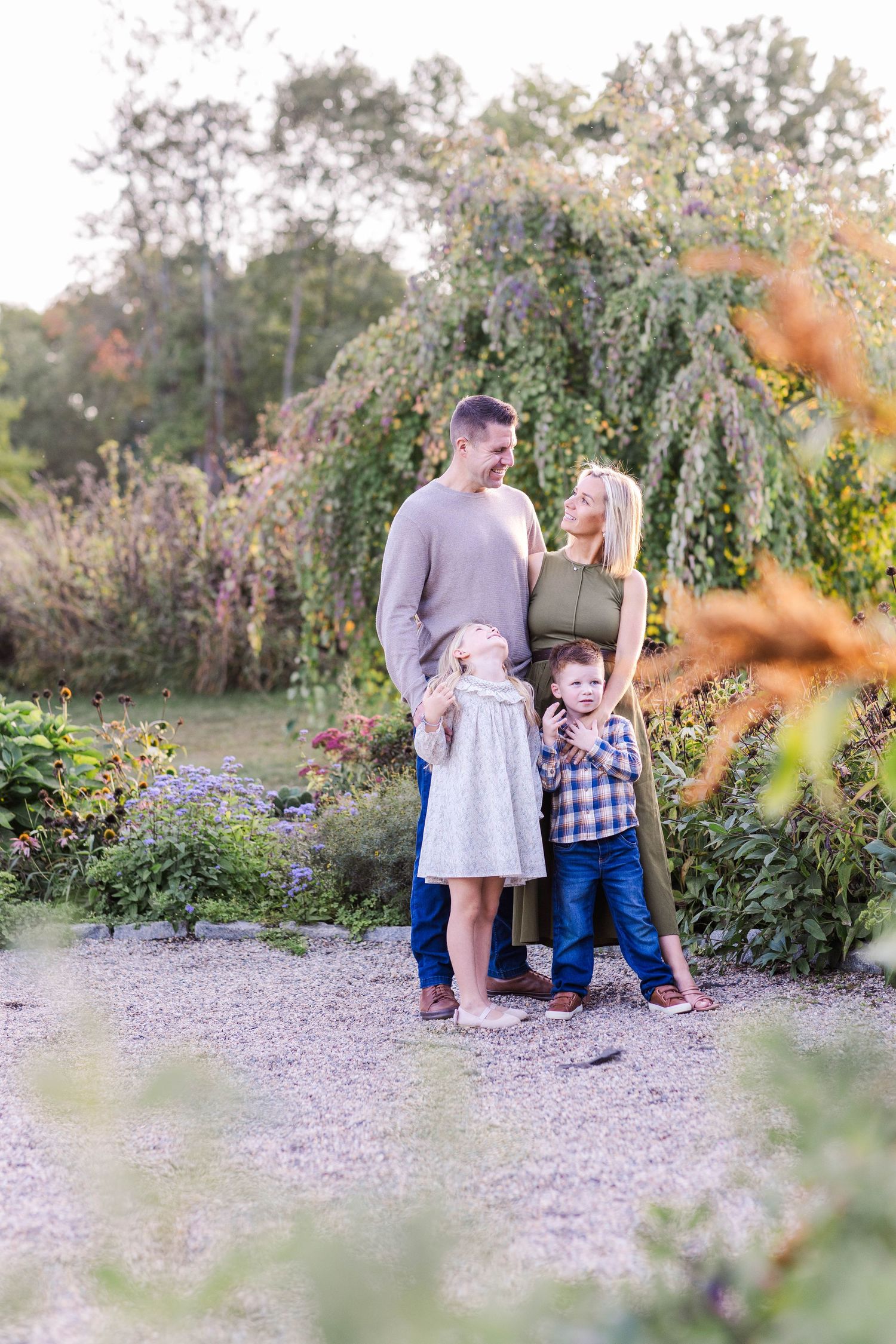 Family looking at each other during a golden hour Connecticut outdoor session — Minmo Photography