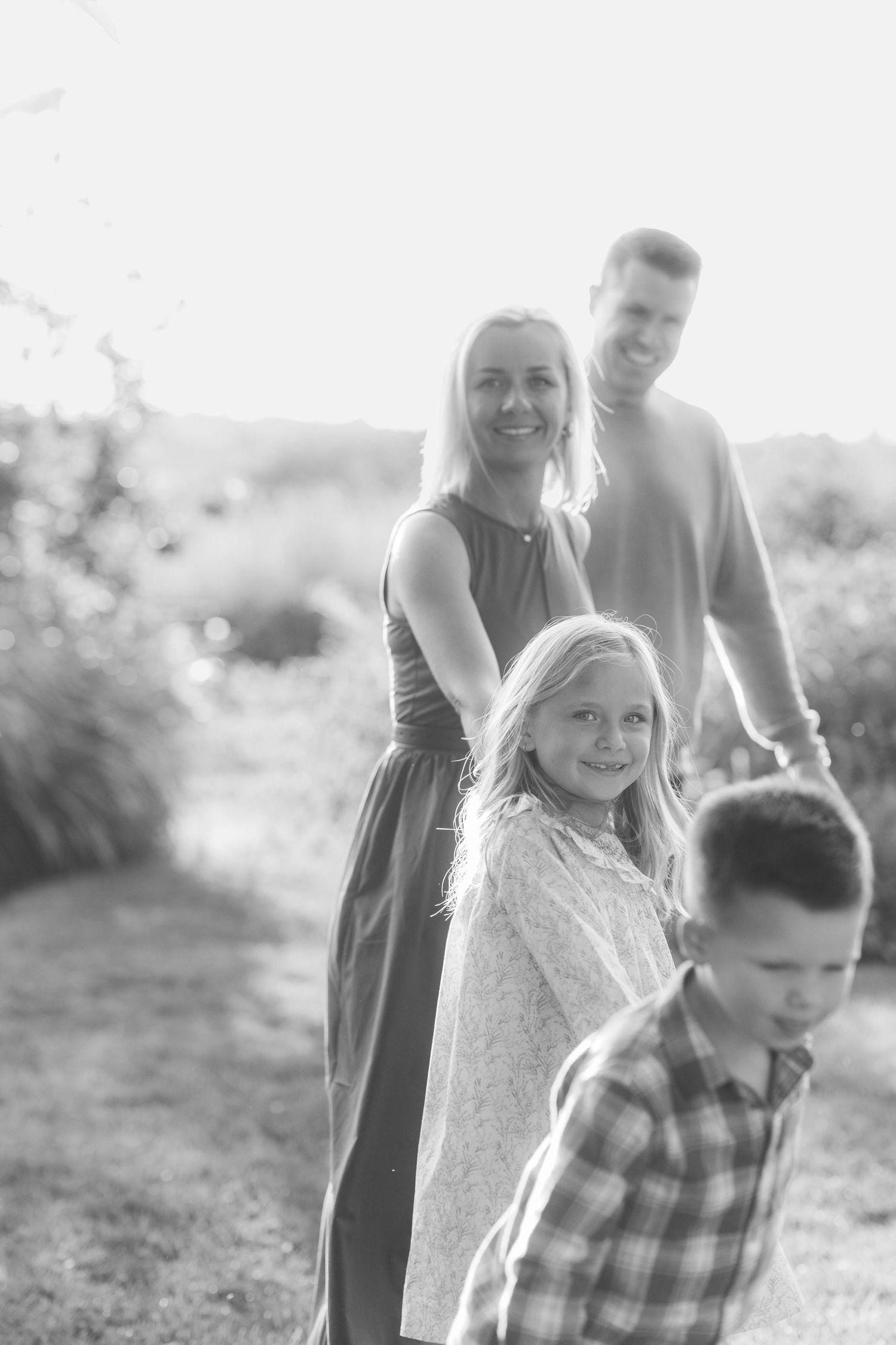 Family holding hands during a golden hour Connecticut outdoor session — Minmo Photography