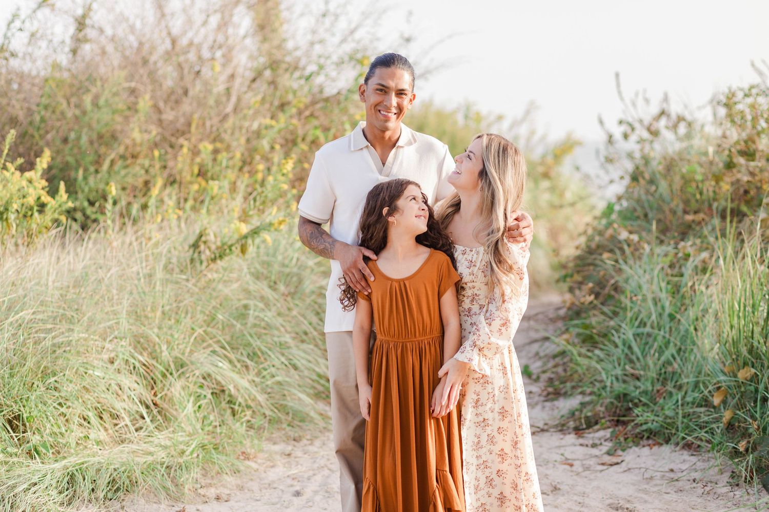 Family smiling and laughing together during a Connecticut beach session — Minmo Photography
