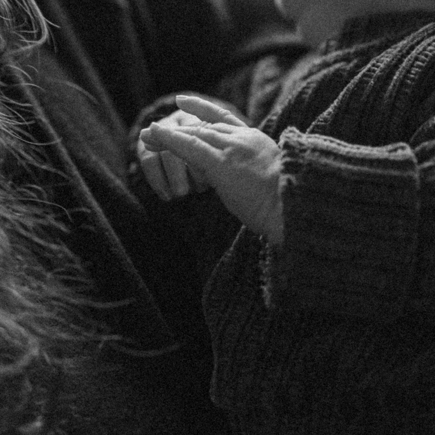 Detail photo of a newborns hand from a newborn photo shoot in boise idaho
