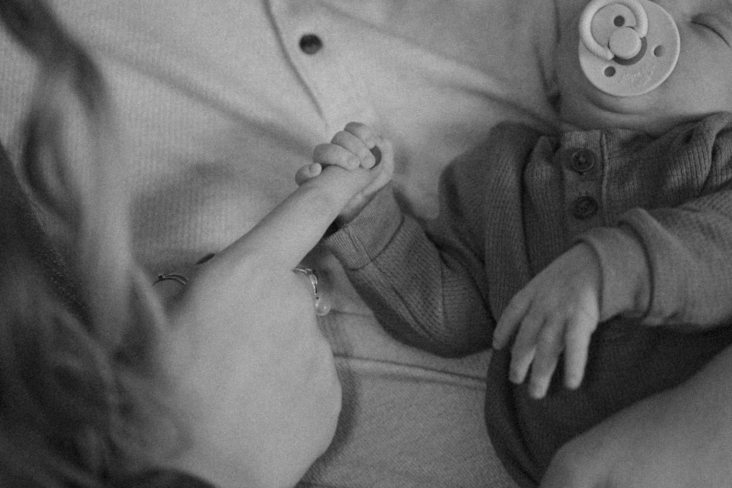 Mother, father, and newborn photo in a family photo session in boise idaho