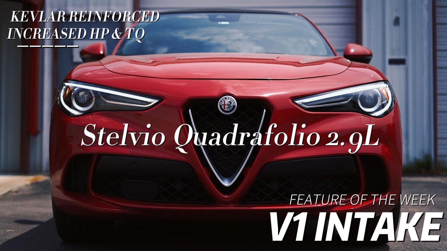 Red Alfa Romeo Stelvio SUV front view showcasing V1 intake feature.
