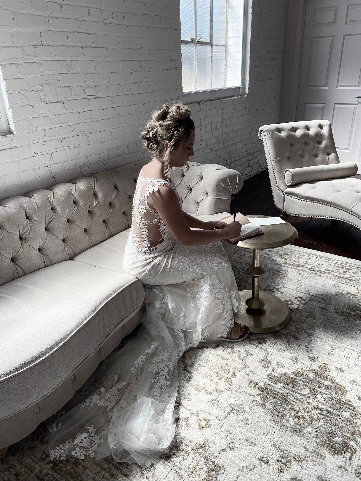 Bridal portrait writing her vows at Northern Pacific Center in Minnesota