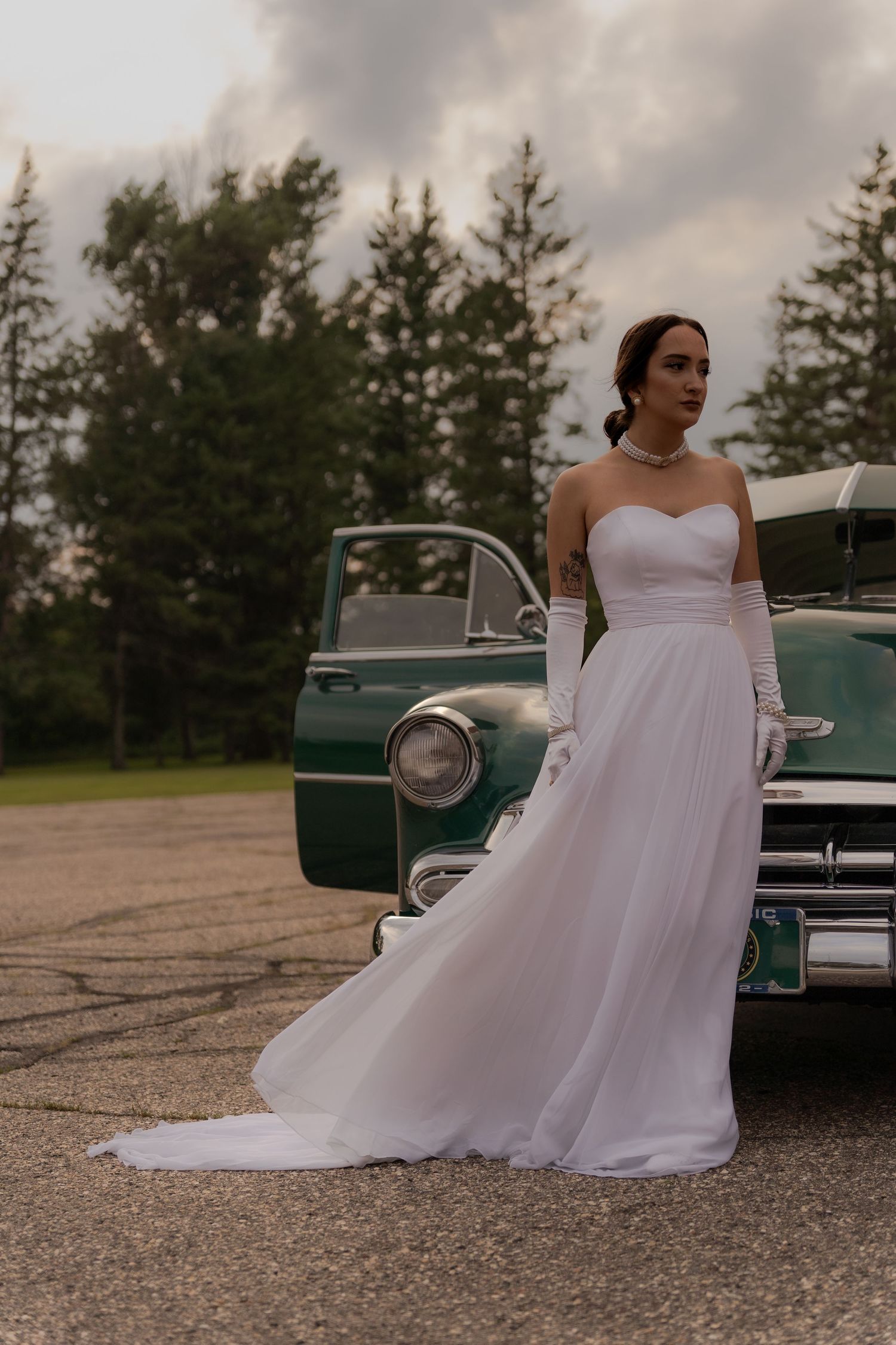 Bridal portrait next to vintage car in Belle River Minnesota