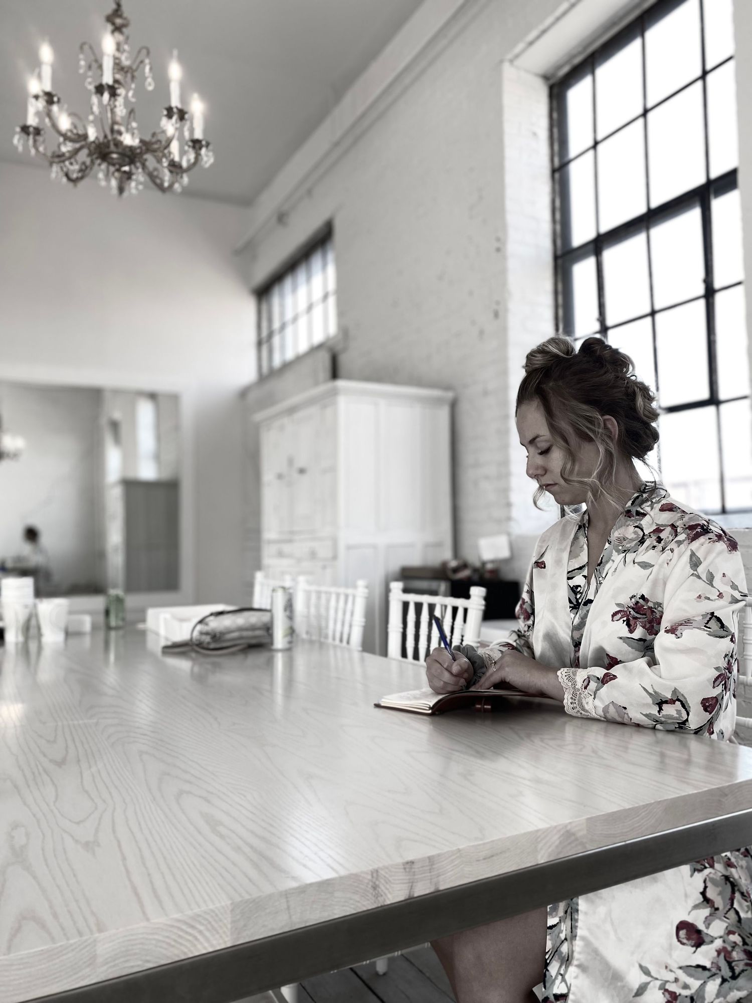 Bridal portrait writing her vows at Northern Pacific Center Wedding Venue in Sauk Rapids Minnesota