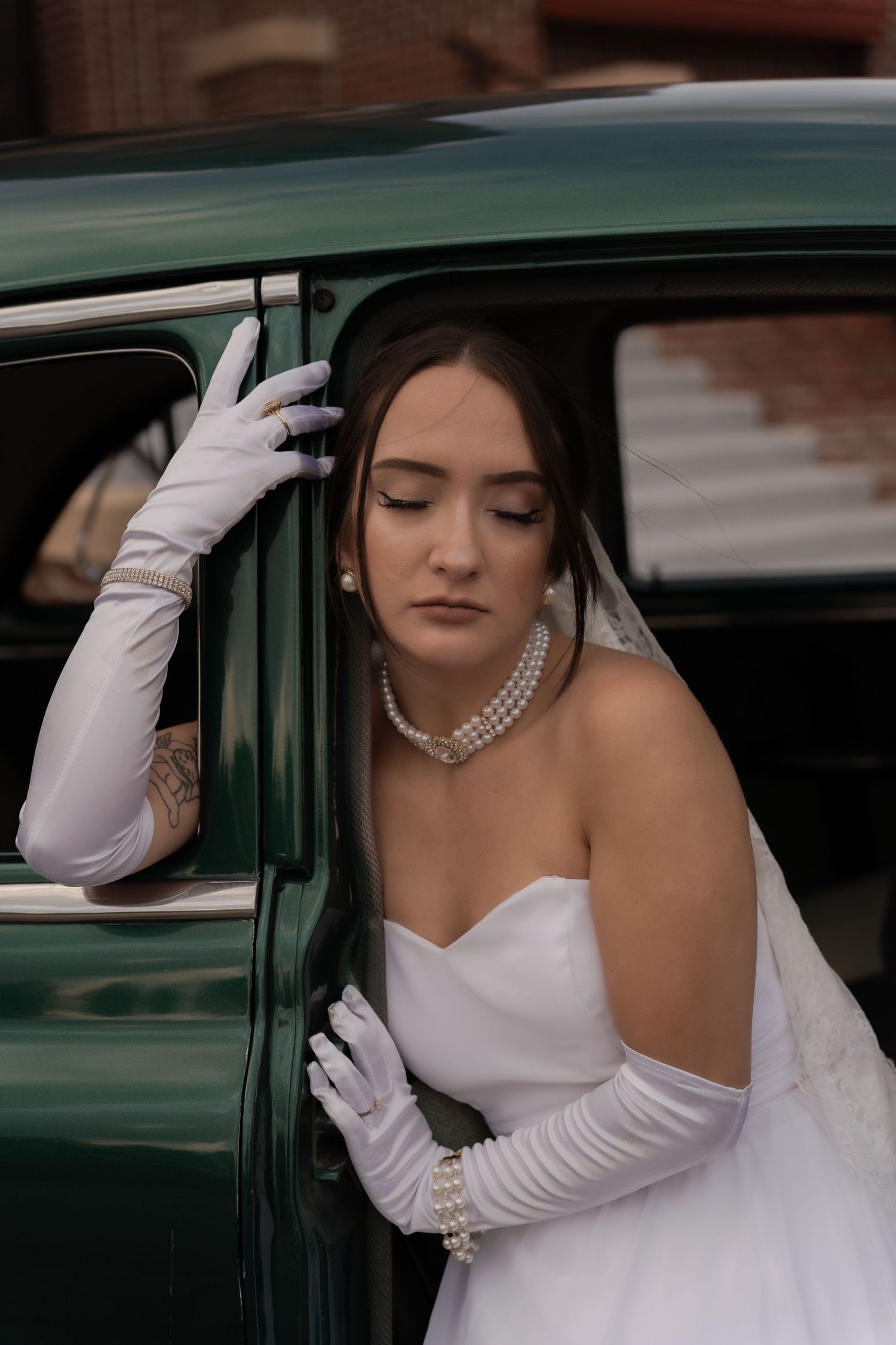 Bridal portrait next to vintage car in Belle River Minnesota