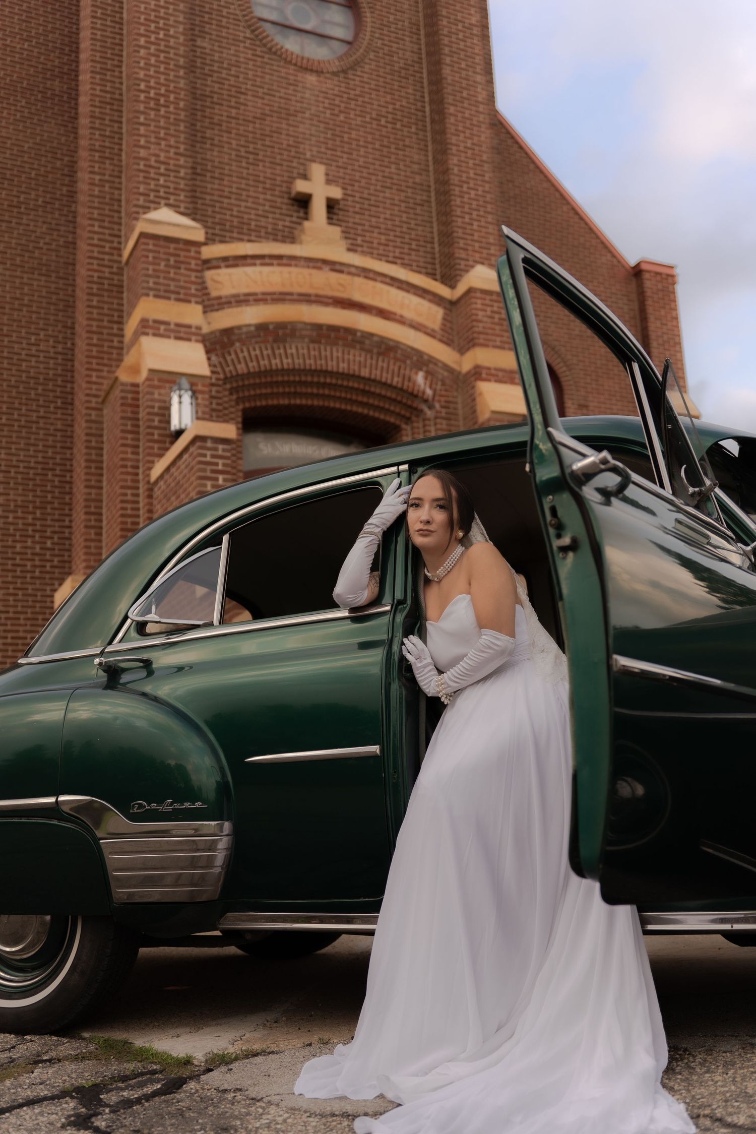 Bridal portrait next to vintage car in Belle River Minnesota