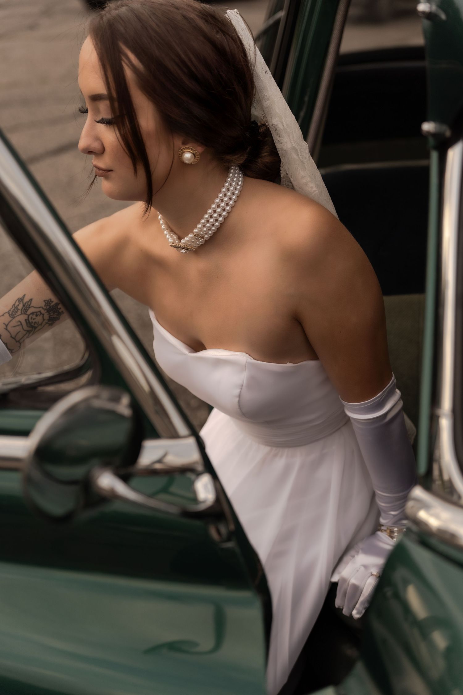 Bridal portrait next to vintage car in Belle River Minnesota