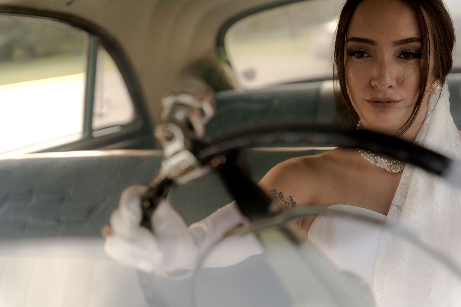 Bridal portrait next to vintage car in Belle River Minnesota