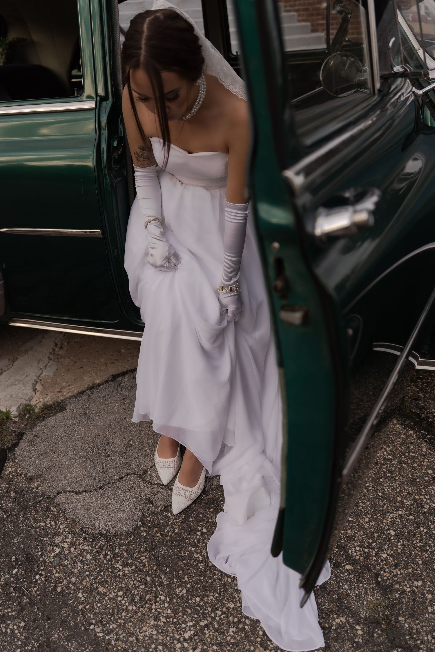 Bridal portrait next to vintage car in Belle River Minnesota