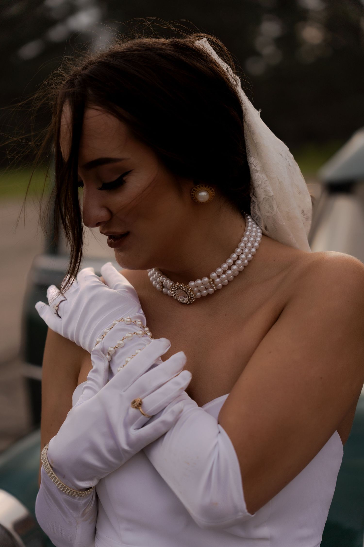 Bridal portrait next to vintage car in Belle River Minnesota