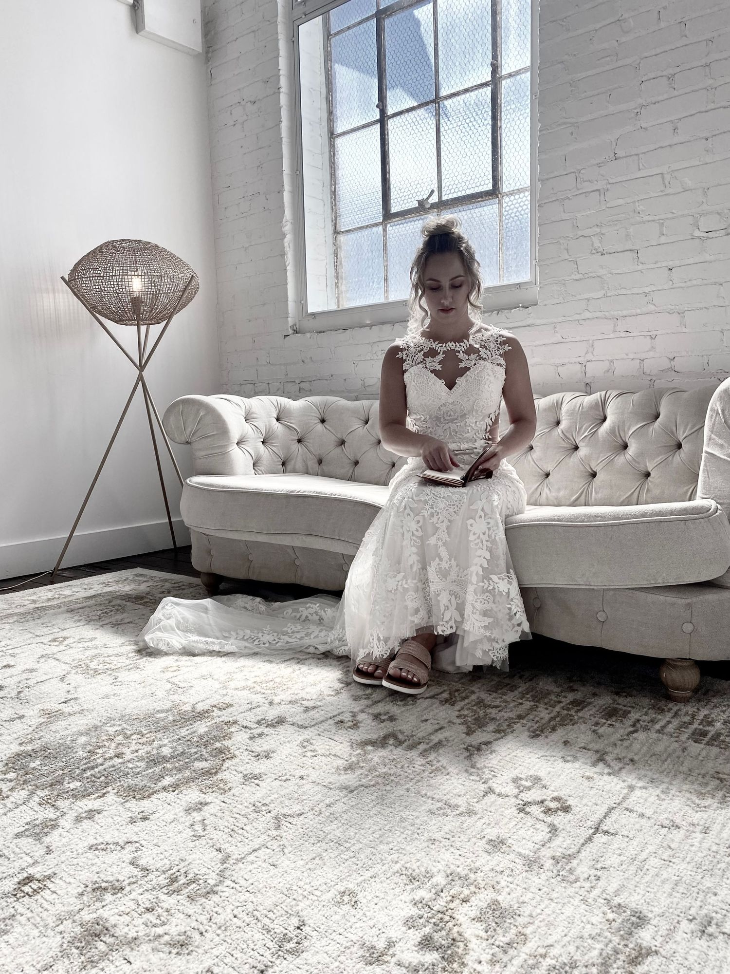 Bridal portrait writing her vows at Northern Pacific Center in Minnesota