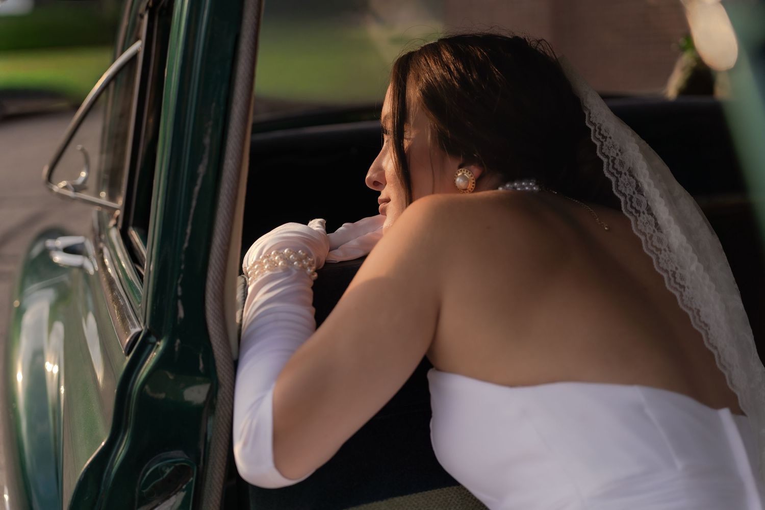 Bridal portrait next to vintage car in Belle River Minnesota