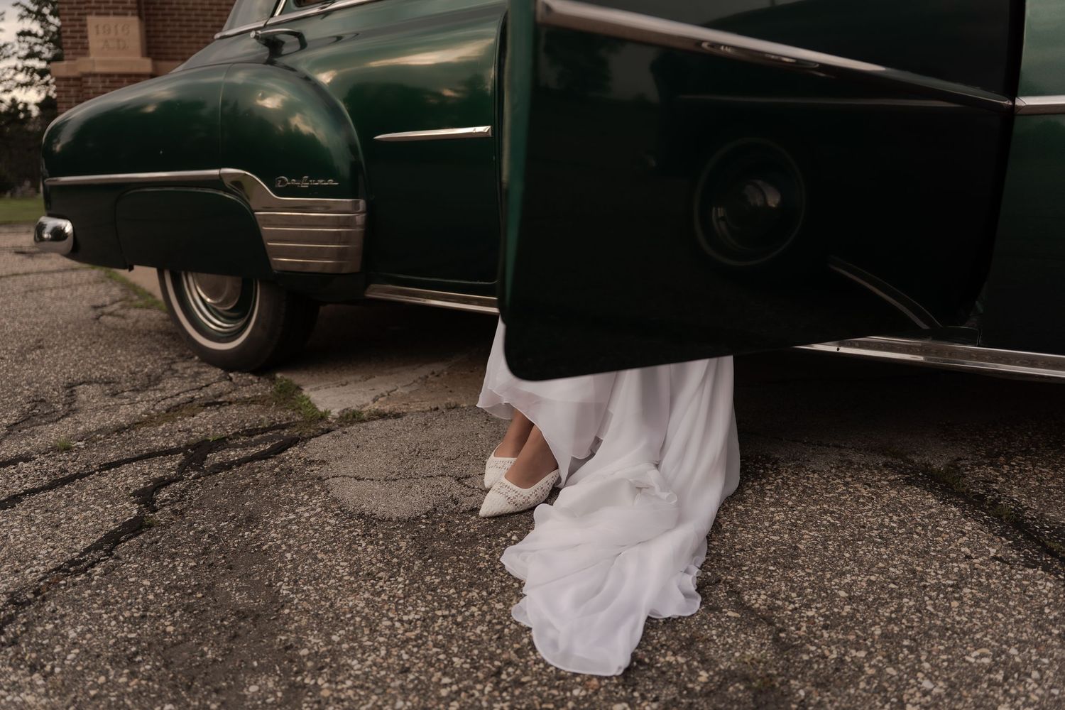 Bridal portrait next to vintage car in Belle River Minnesota