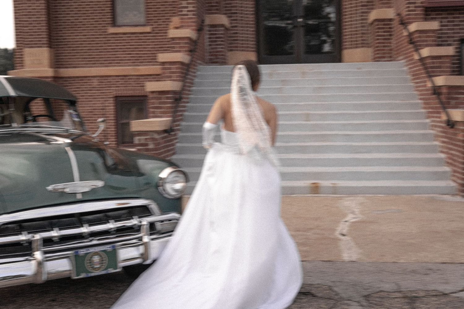 Bridal portrait next to vintage car in Belle River Minnesota