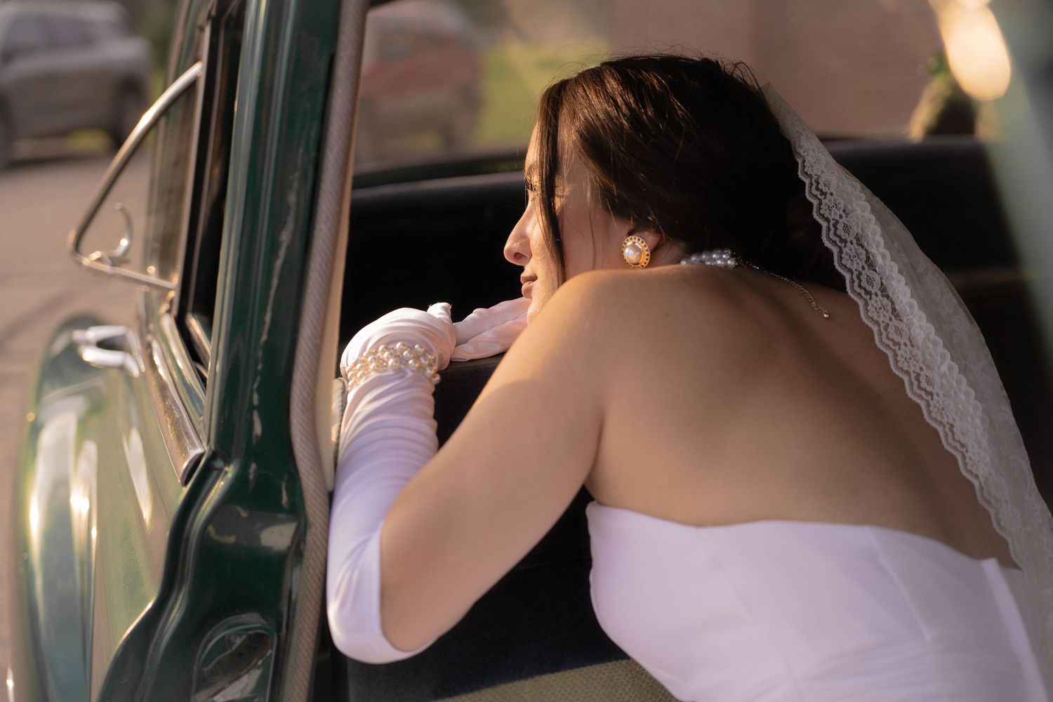 Bridal portrait next to vintage car in Belle River Minnesota