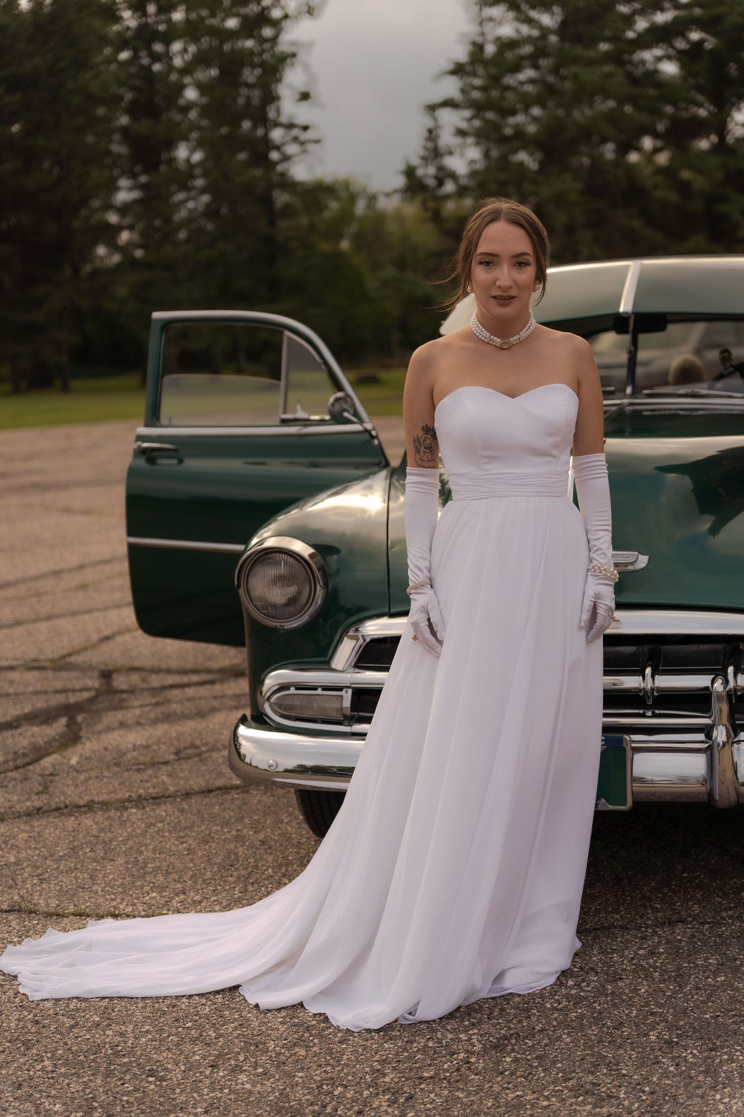Bridal portrait next to vintage car in Belle River Minnesota
