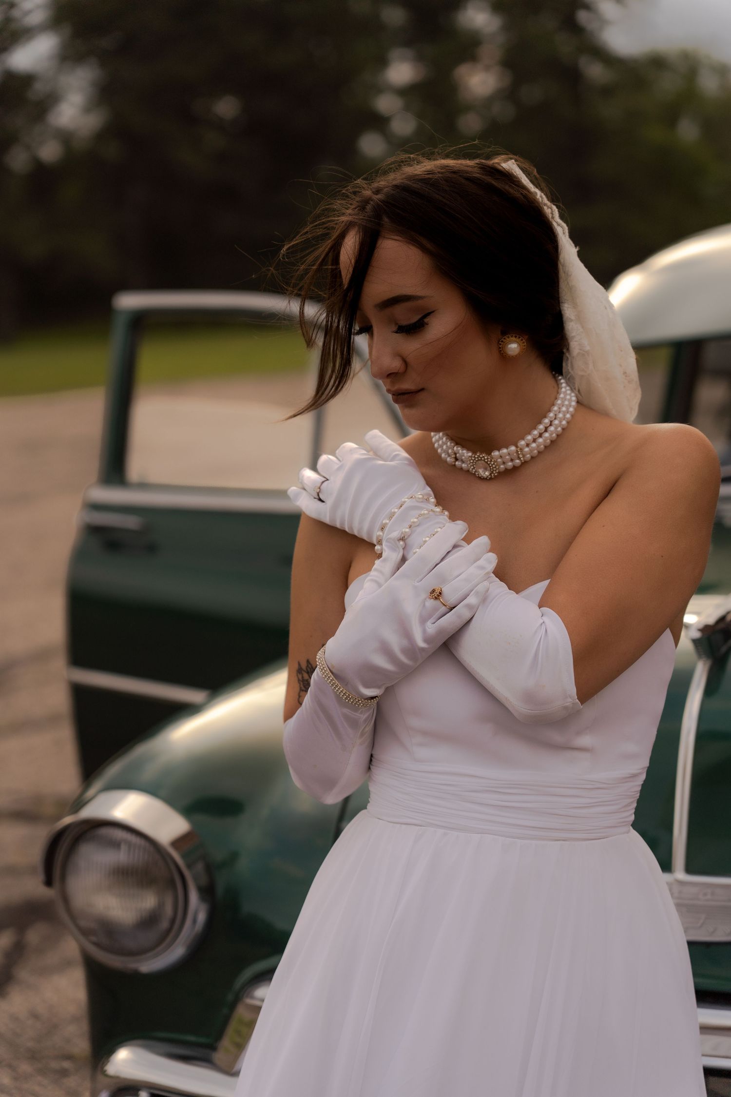 Bridal portrait next to vintage car in Belle River Minnesota