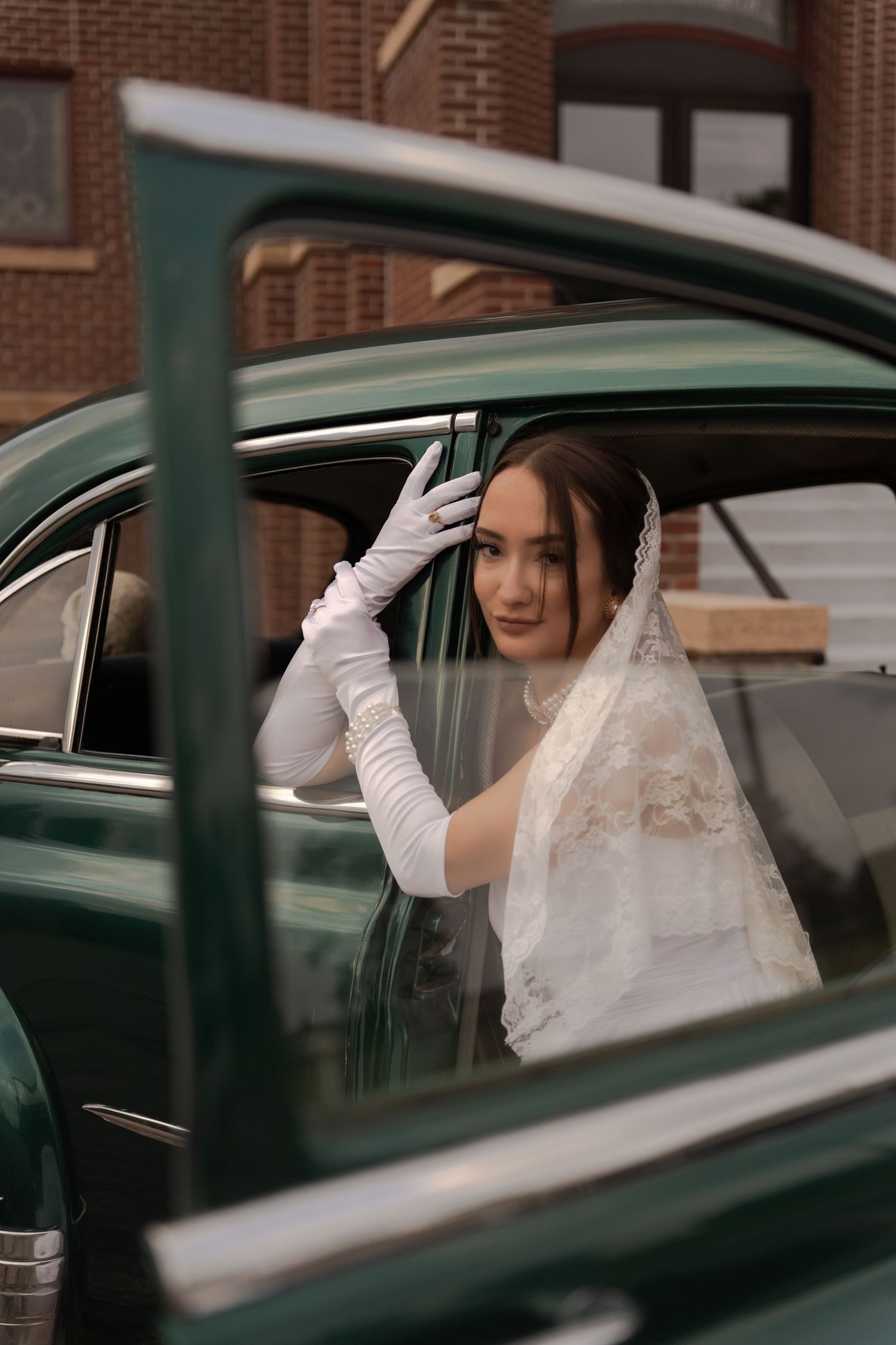 Bridal portrait next to vintage car in Belle River Minnesota