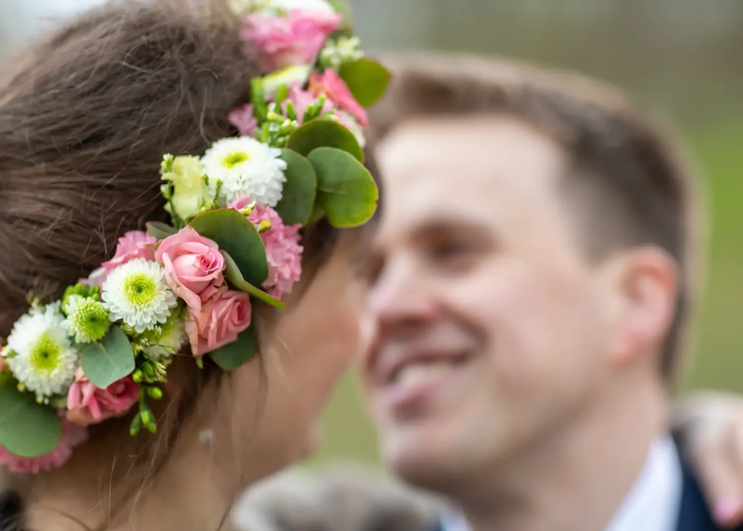 Wedding party detail with floral decorations and pink flowers.