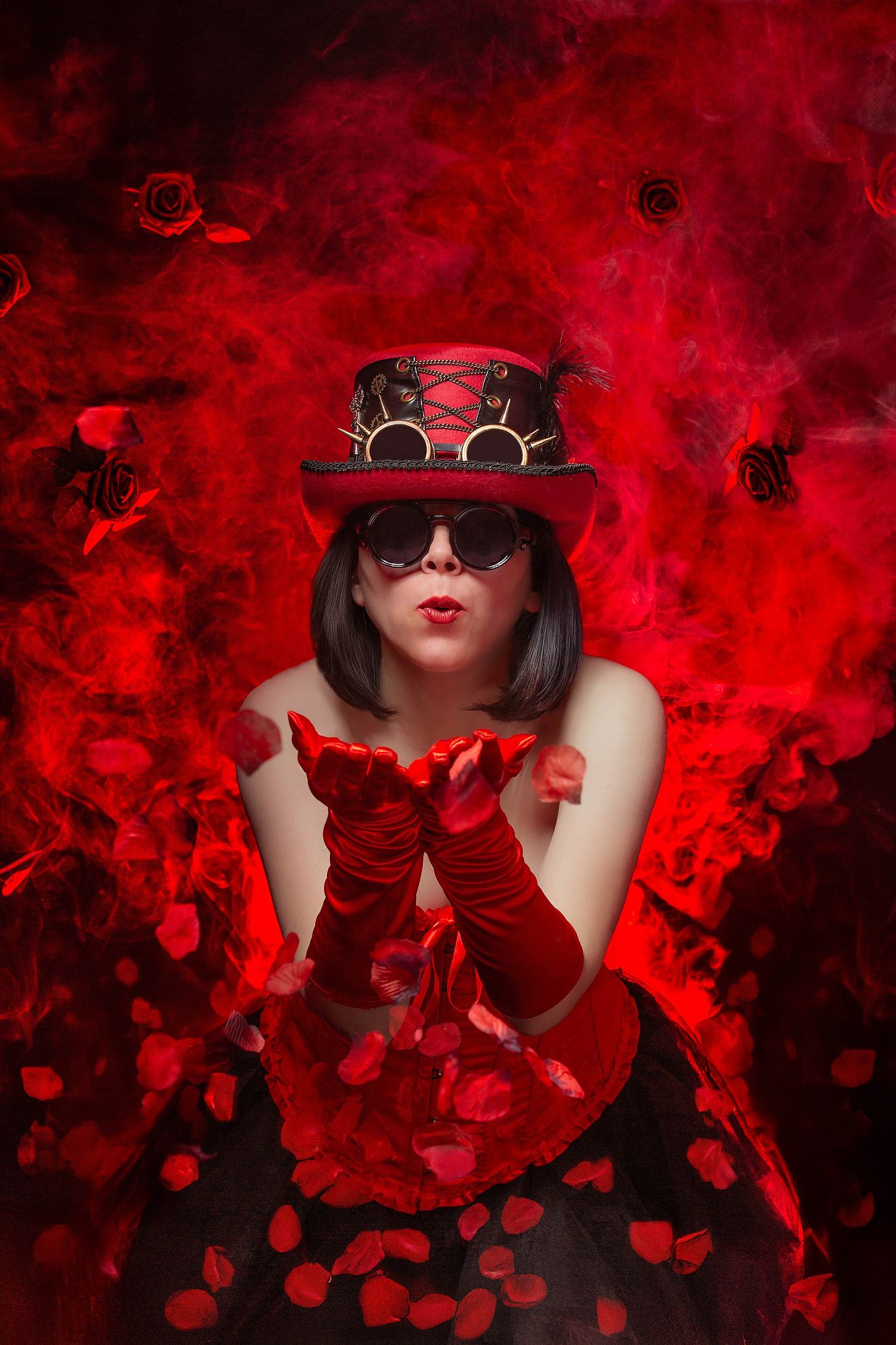 Gothic-style portrait with figure in top hat and red gloves amid swirling red smoke effects.