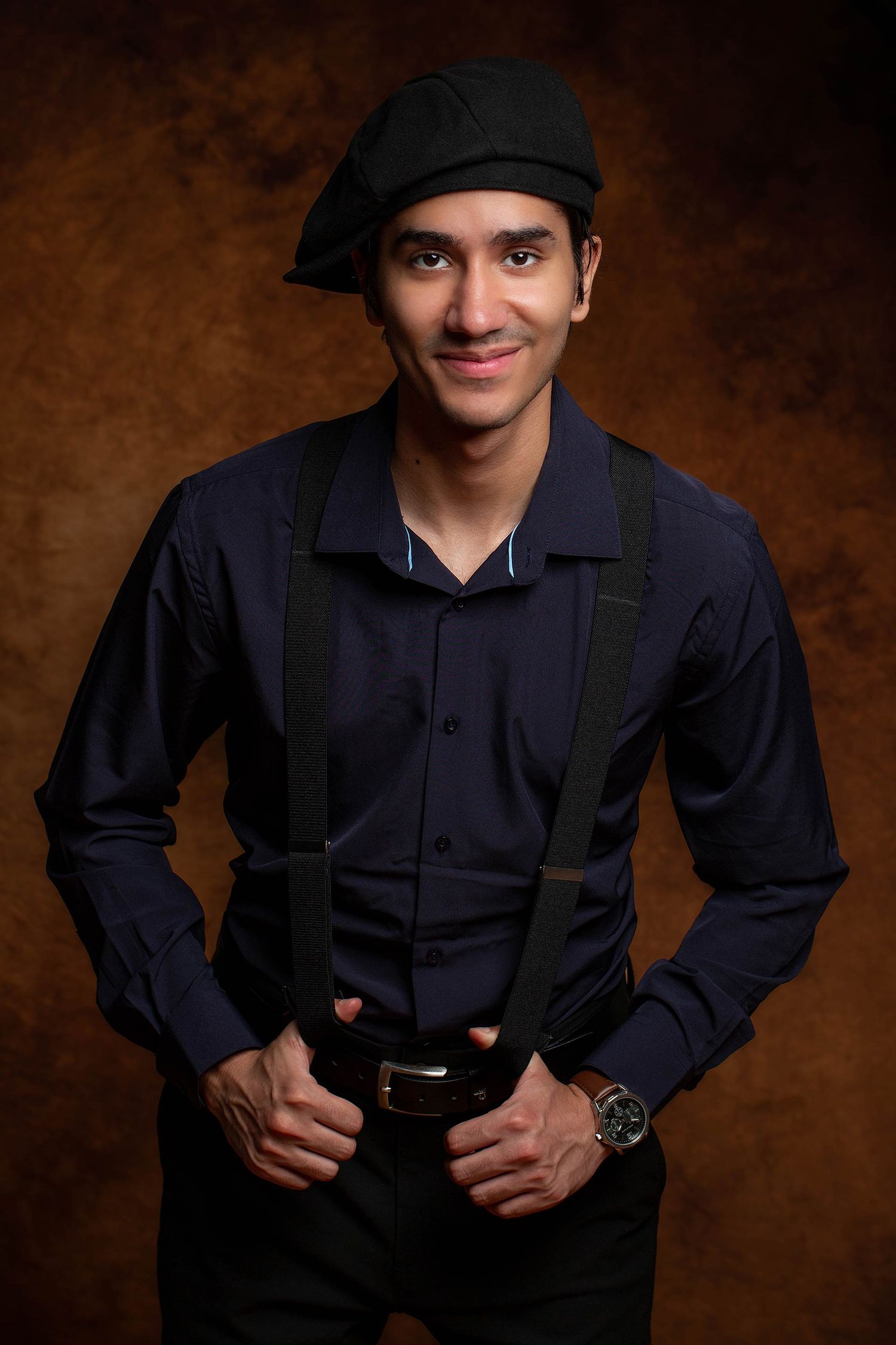 Studio portrait series showing person in navy uniform and cap against dark background.