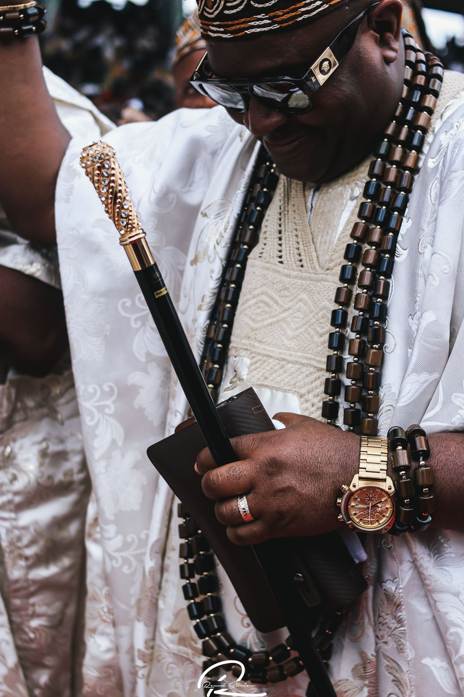 Fashion walking stick and beads.
