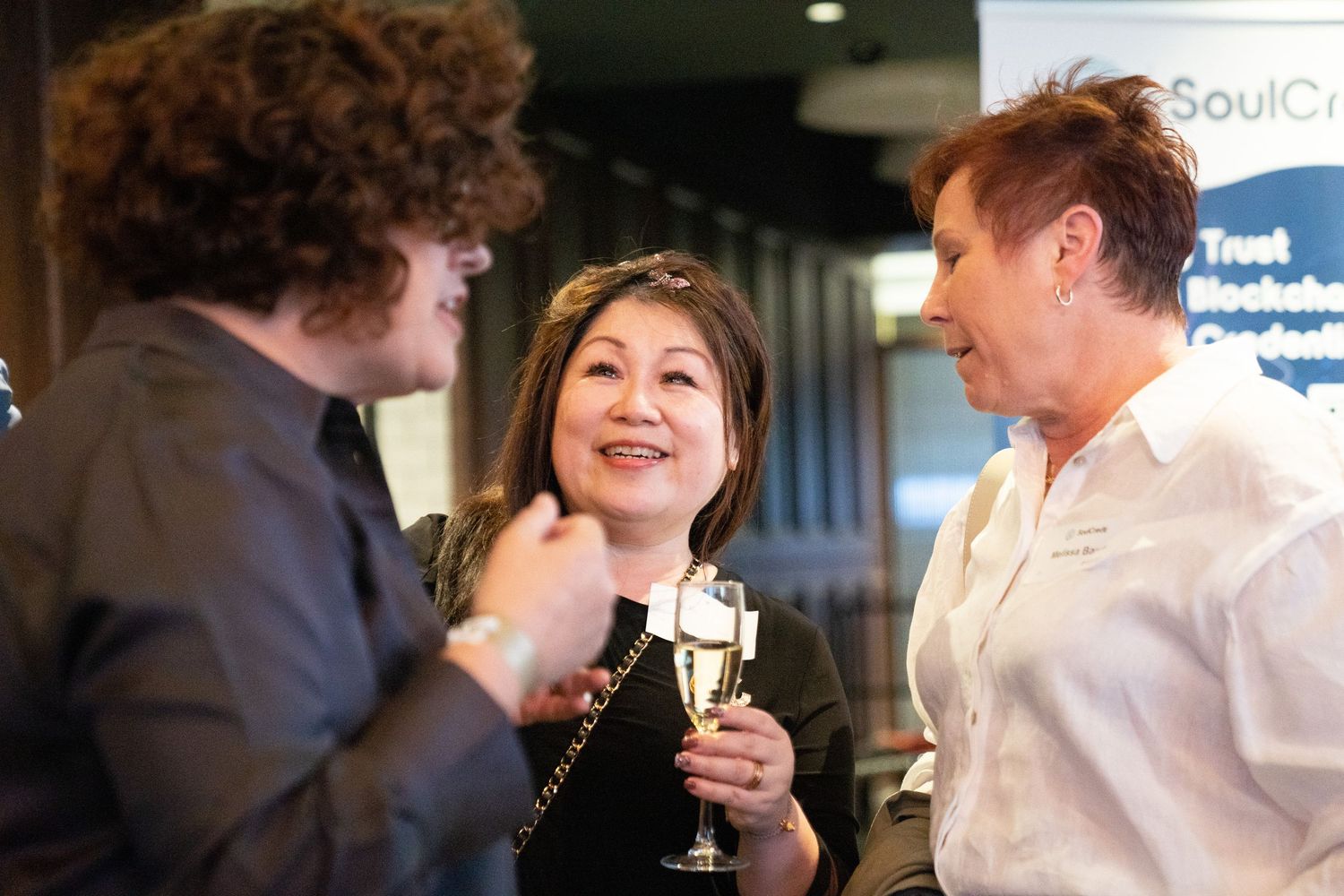 Event photographer capturing candid moments at a business conference