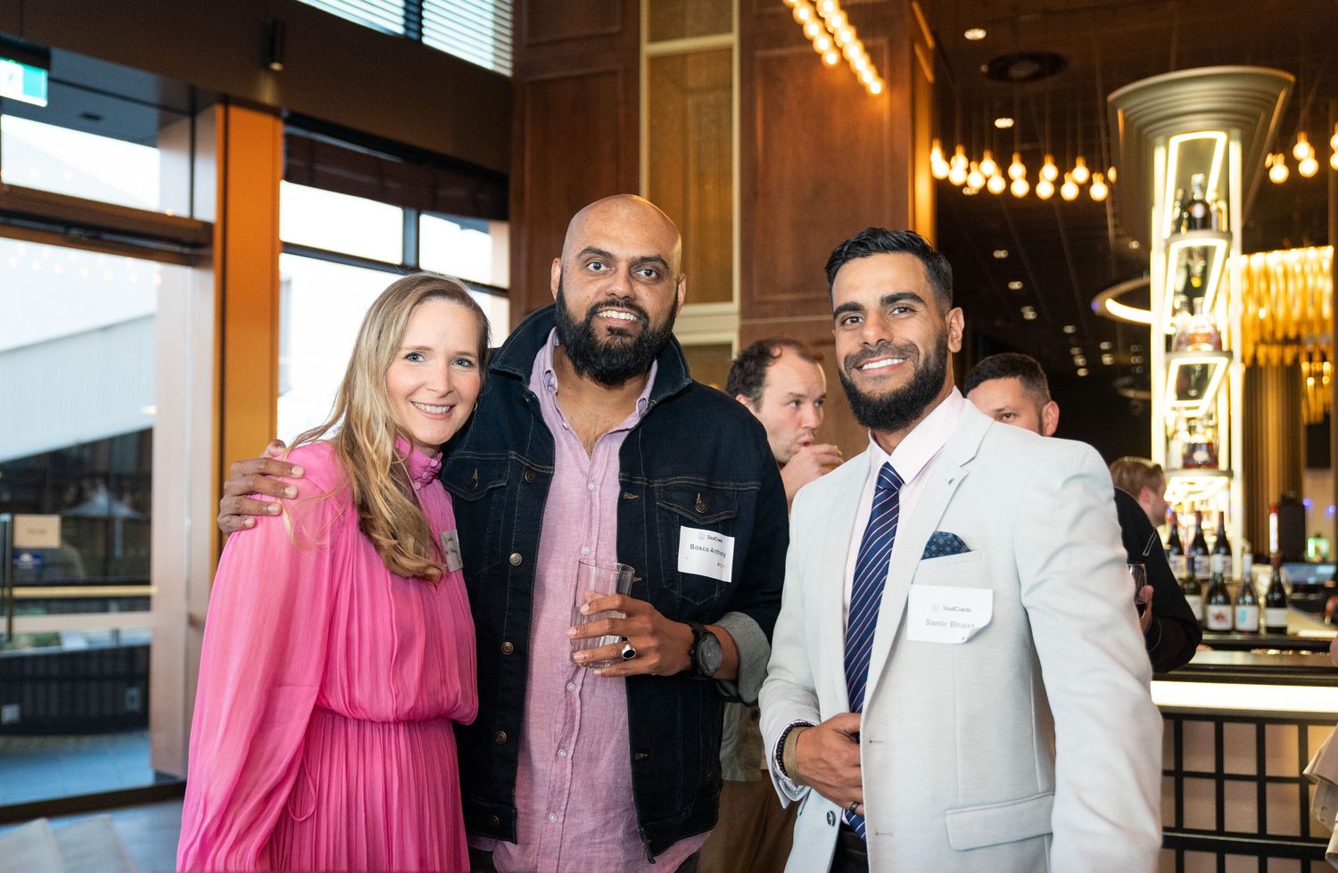 Event photographer capturing candid moments at a business conference