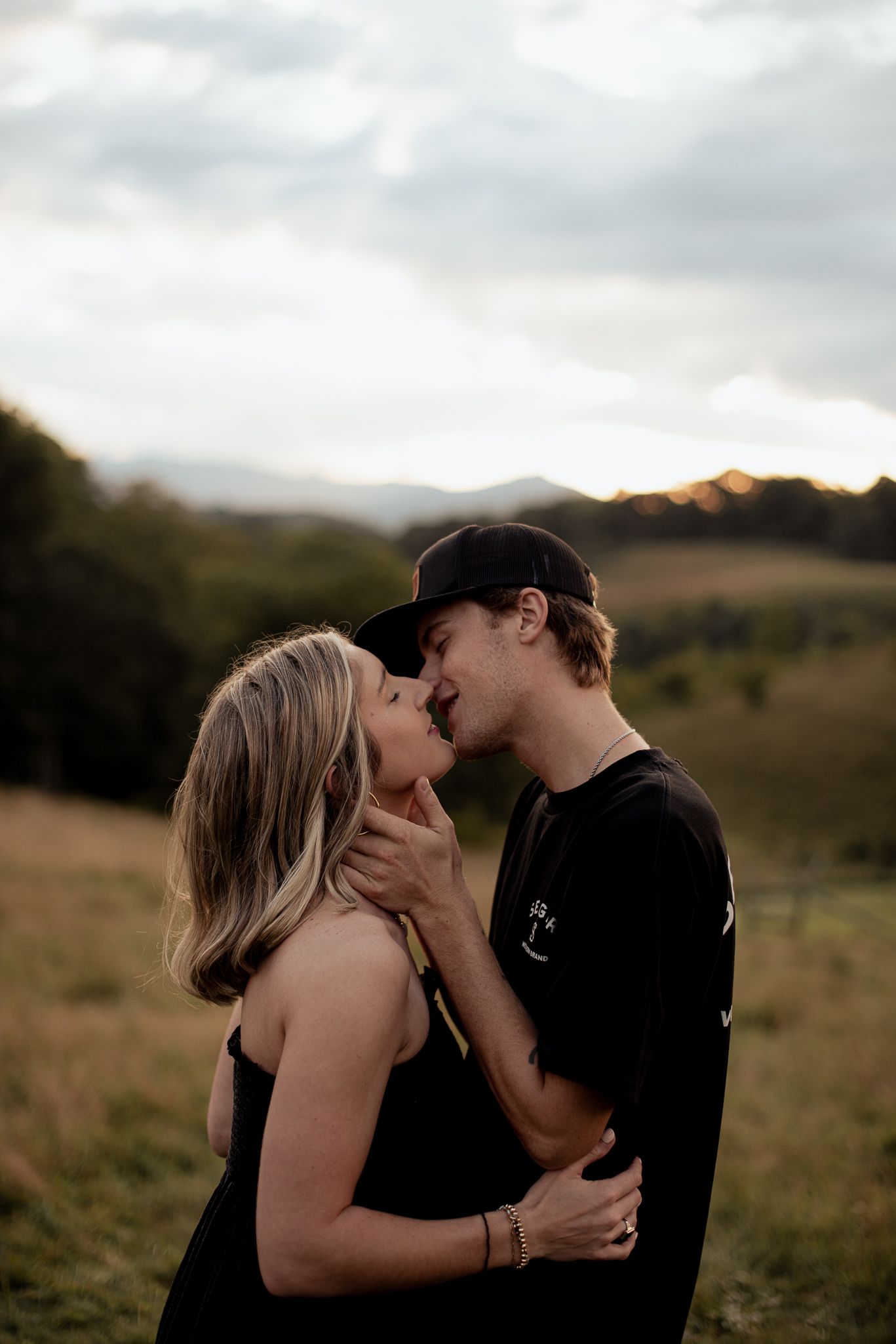a couple embracing about to kiss