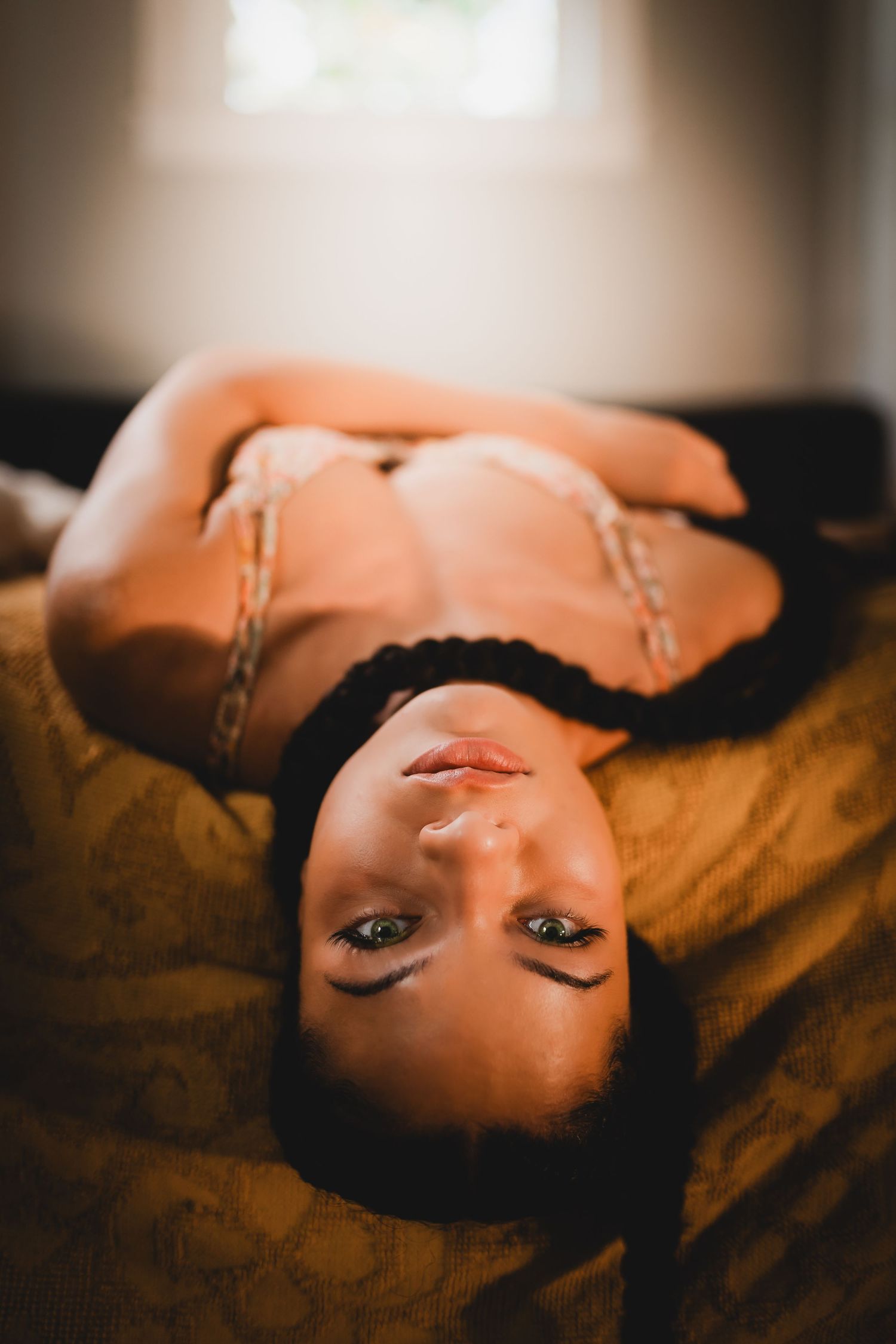 Savannah portrait photographer David Monroe —Intimate portrait series on textured brown fabric with dramatic lighting effects.
