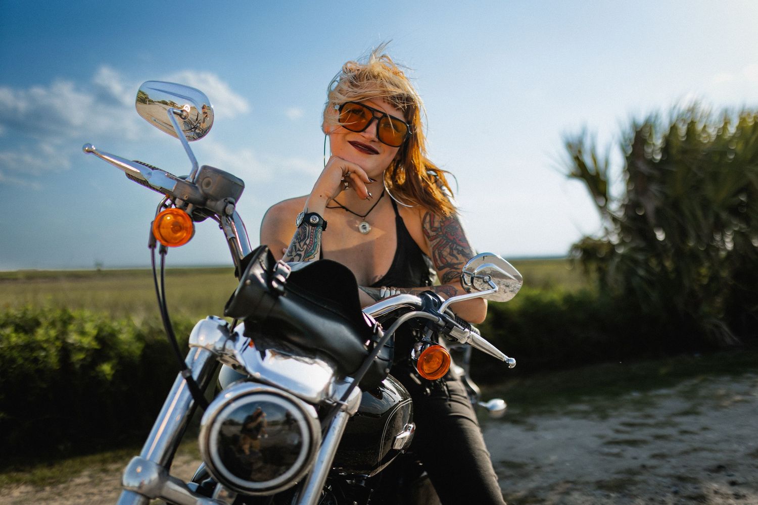 Savannah portrait photographer David Monroe —Motorcycle parked against blue sky and rural landscape.