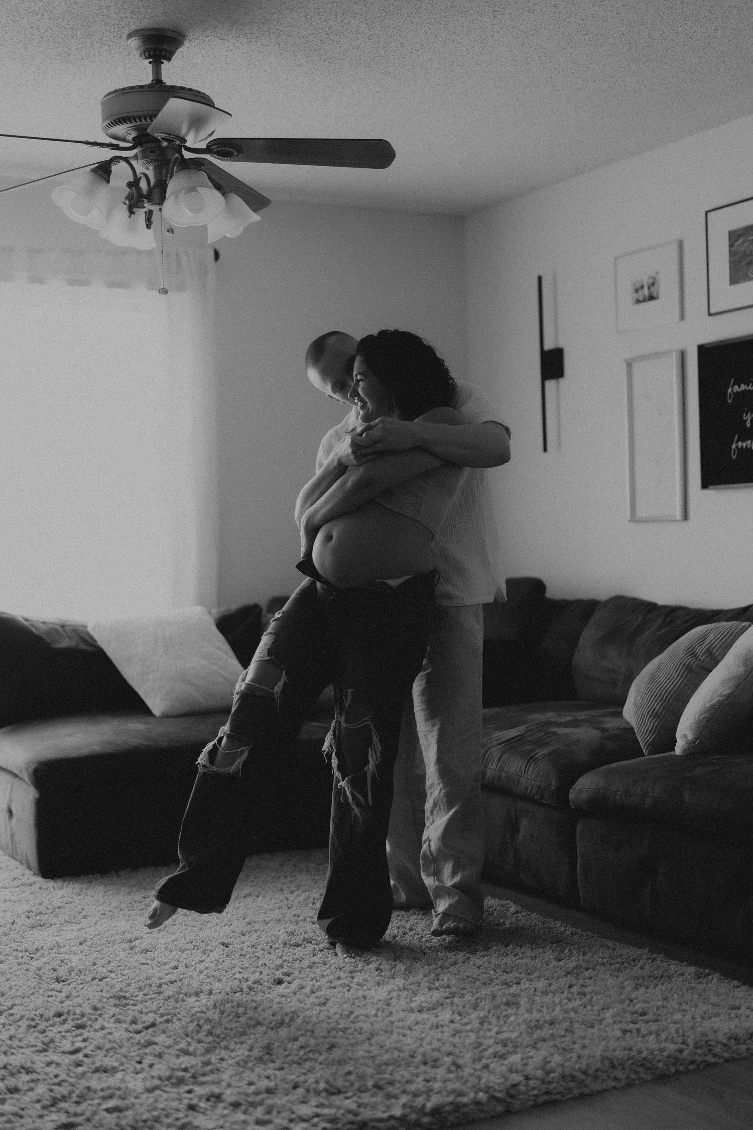 A black and white photo sequence shows someone falling backwards onto a living room couch in dramatic motion.