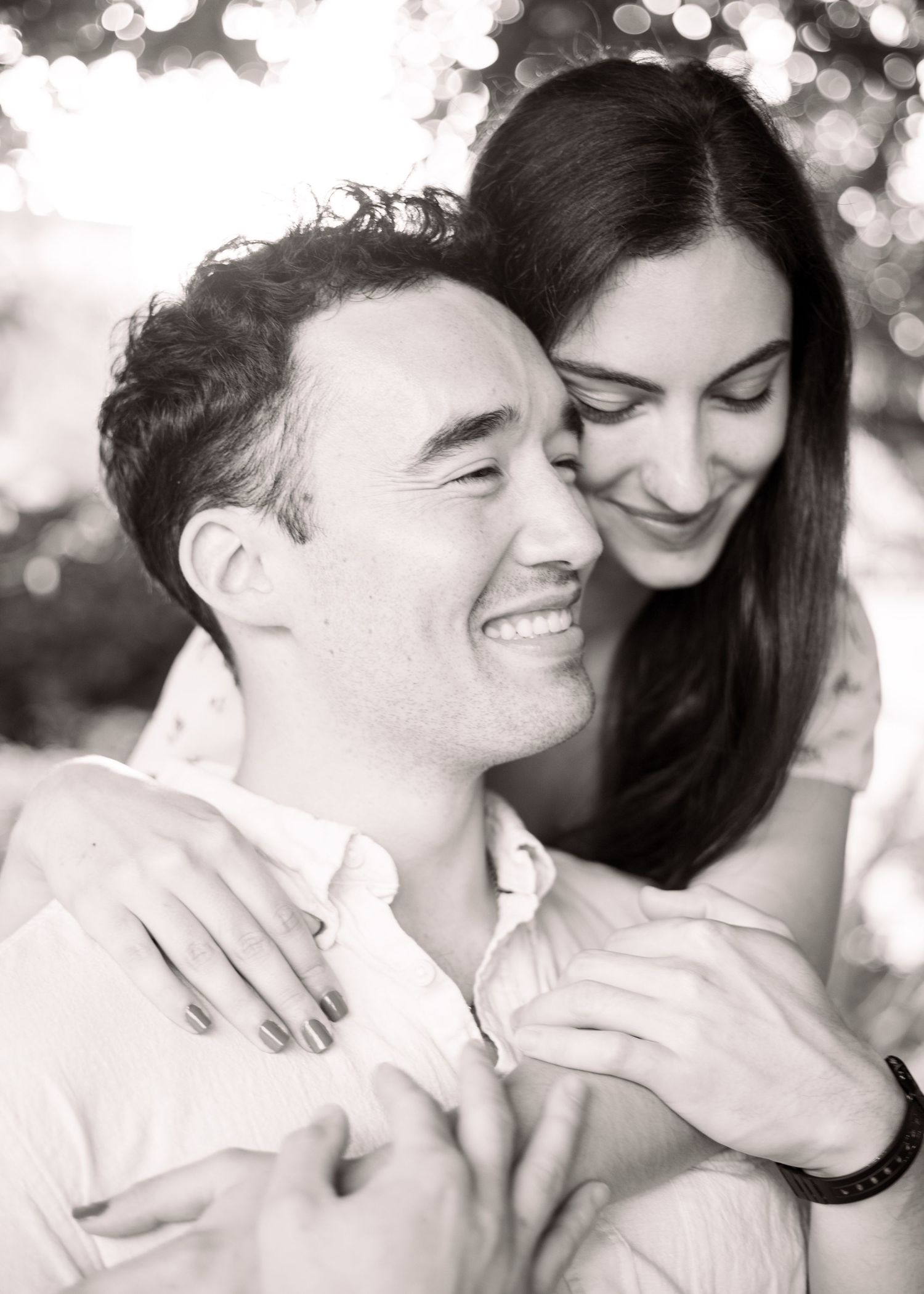 Couple cuddling black white close-up photography