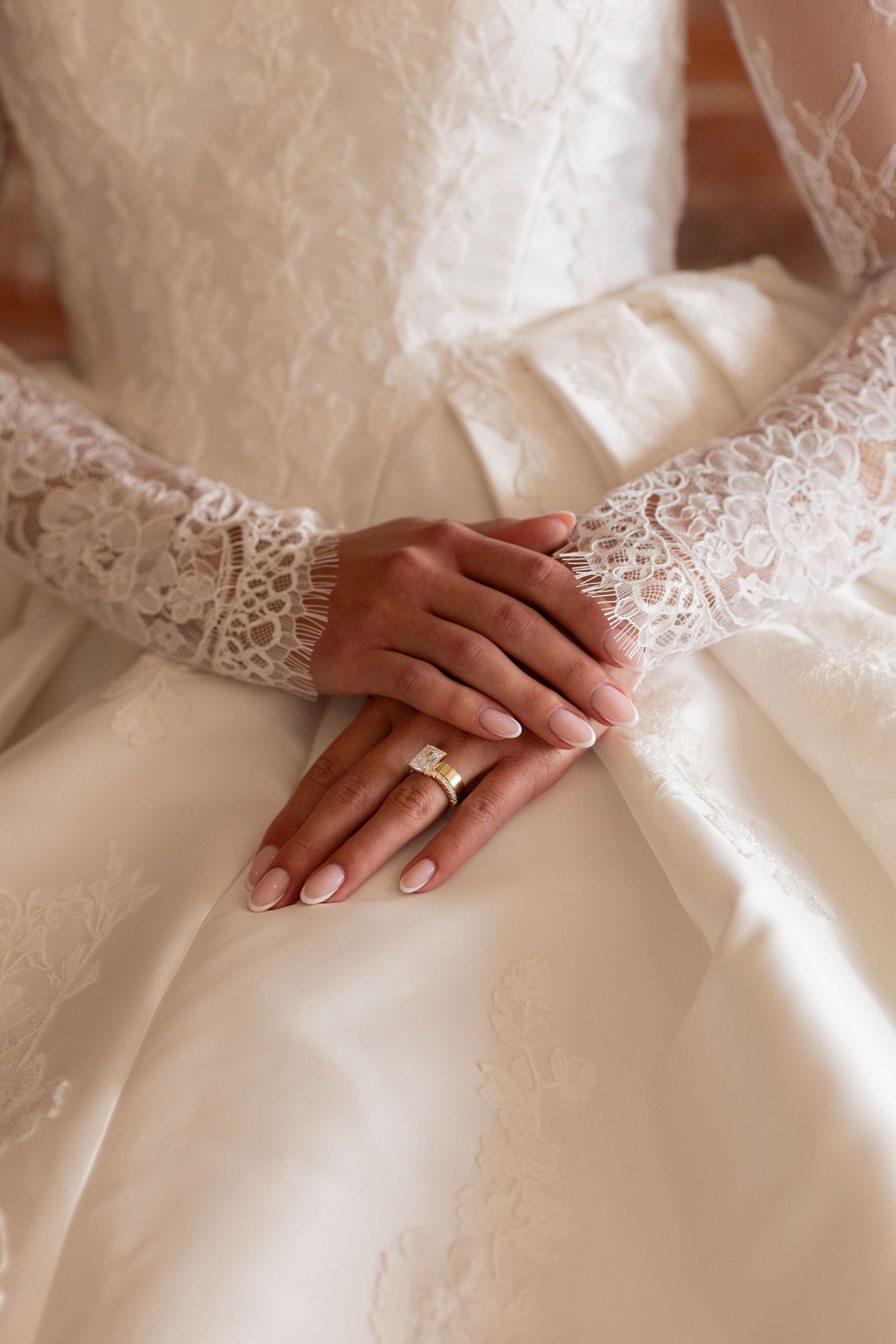 Bride's hands showing wedding ring photography